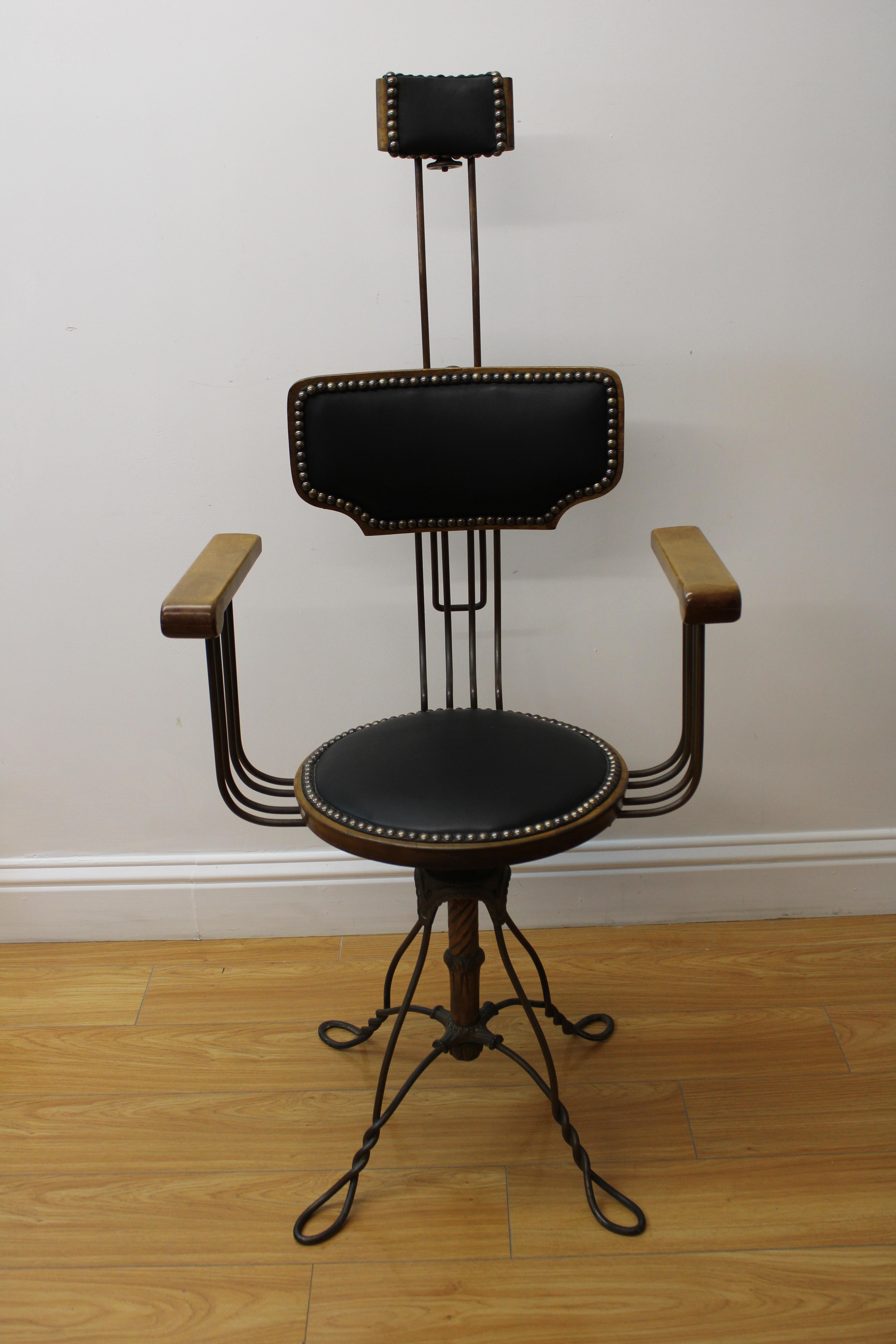 C. 19th century

Cast iron / leather chair w/ a unusual adjustable back ( Nail Head Trim )

This is possibly an old dentist chair.