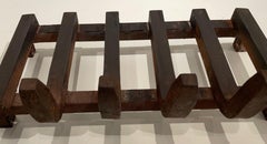 Portaceppi in ghisa con due ciotole in ottone Attribuito a Jean Royere Francia 1950.