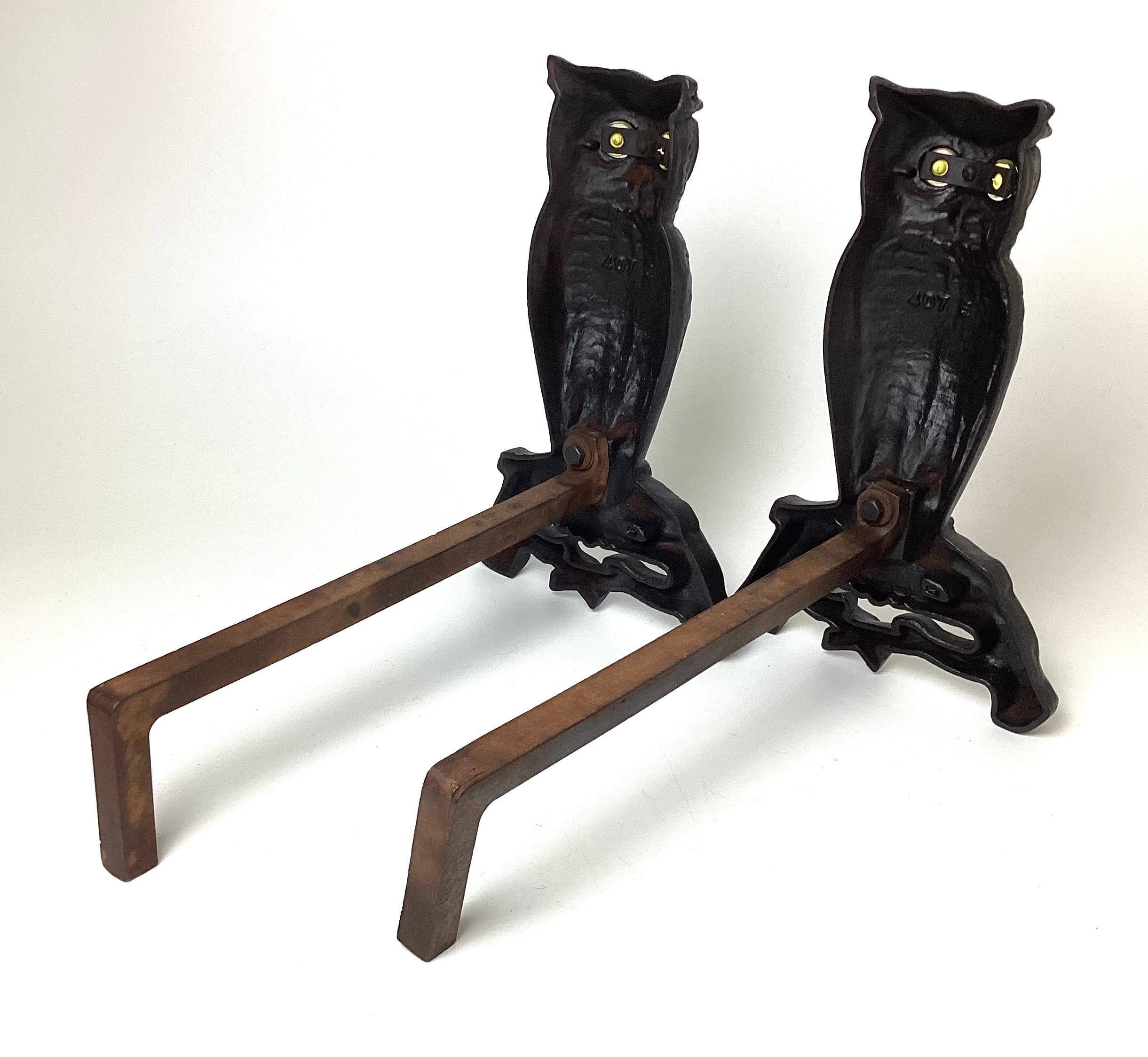 antique owl andirons with glass eyes