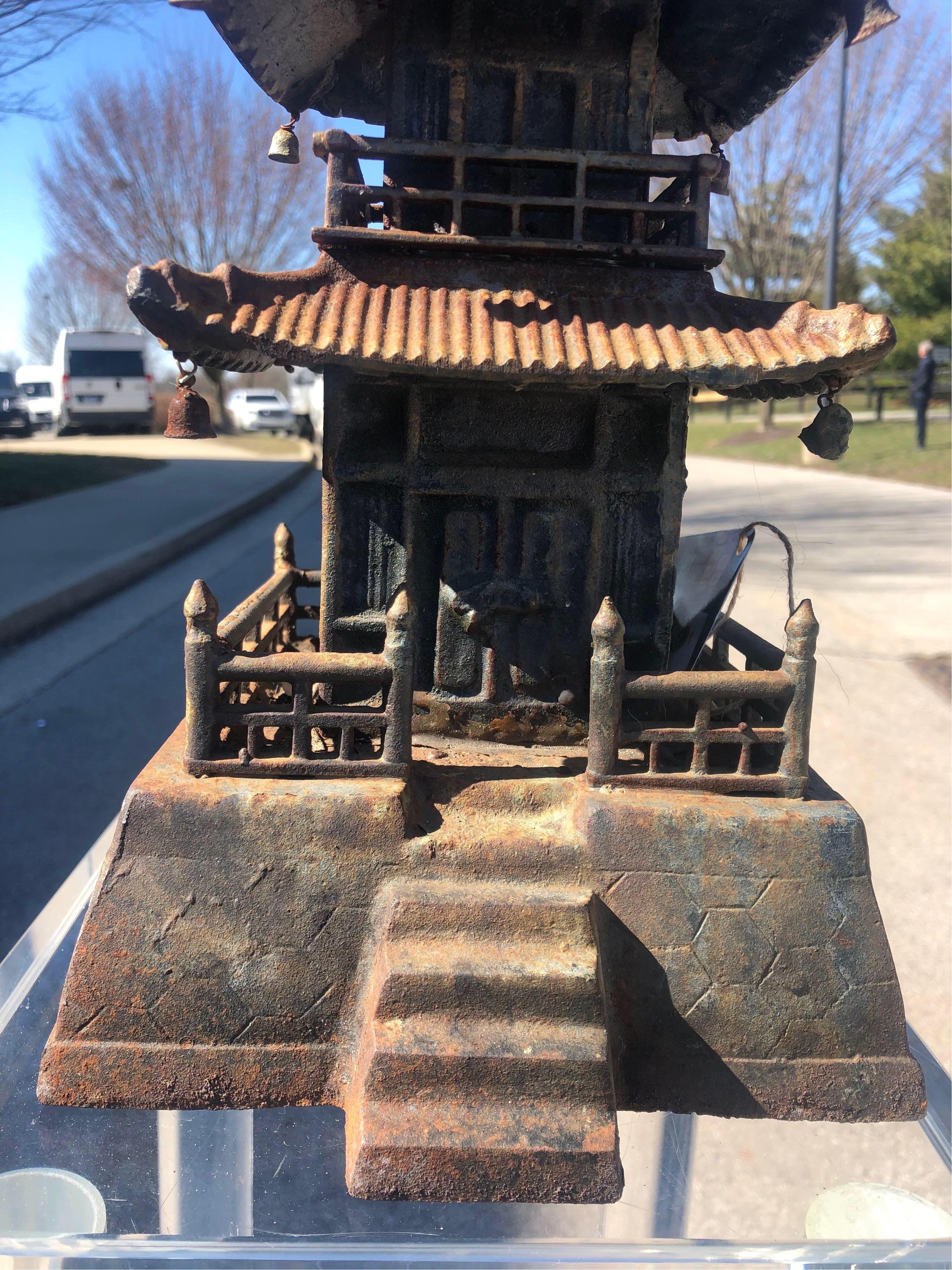 Very unique cast iron pagoda with traces of gold gilt.