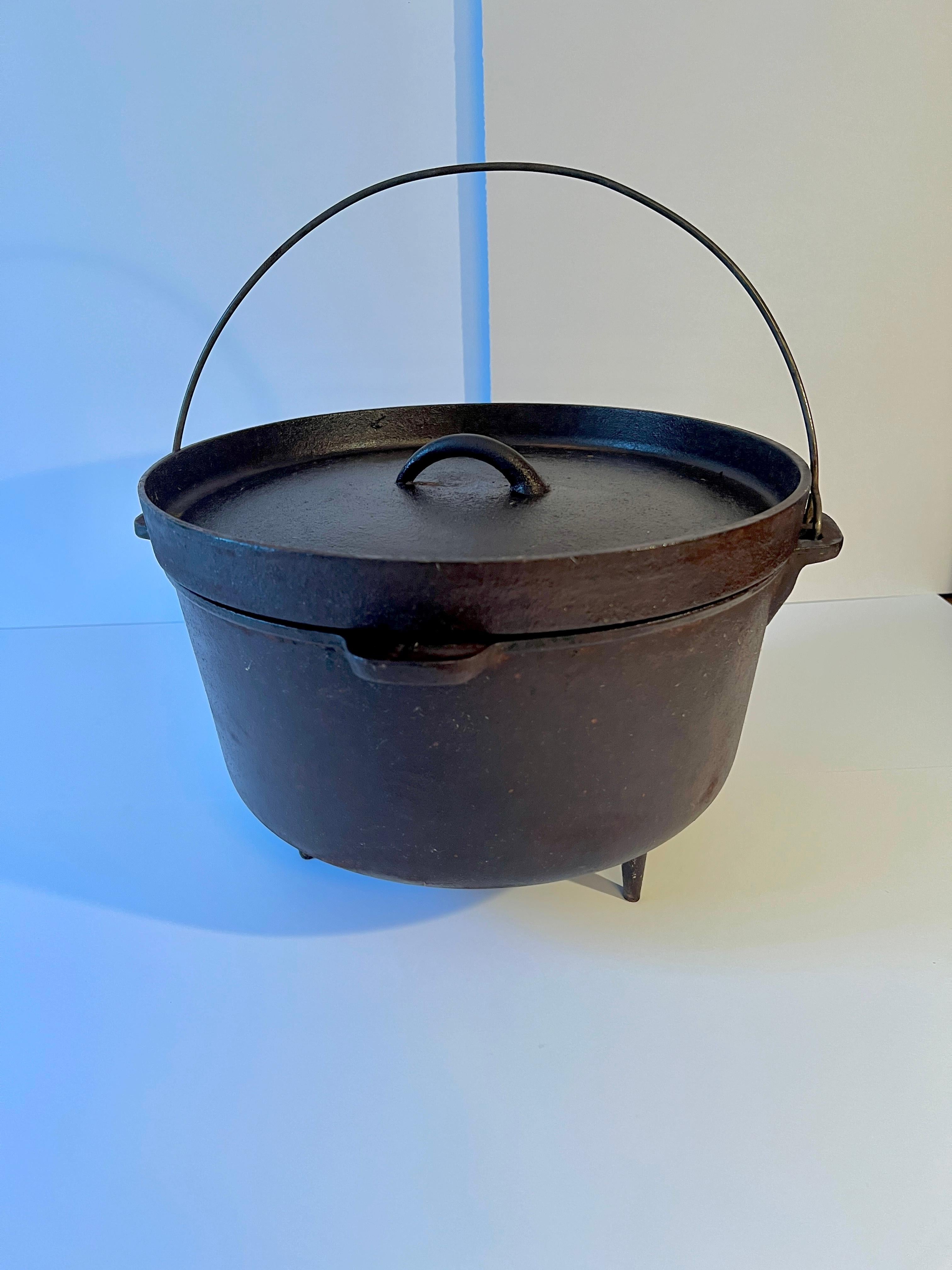 Rustic Cast Iron Pot or Cauldron on Three Lets with Handle For Sale