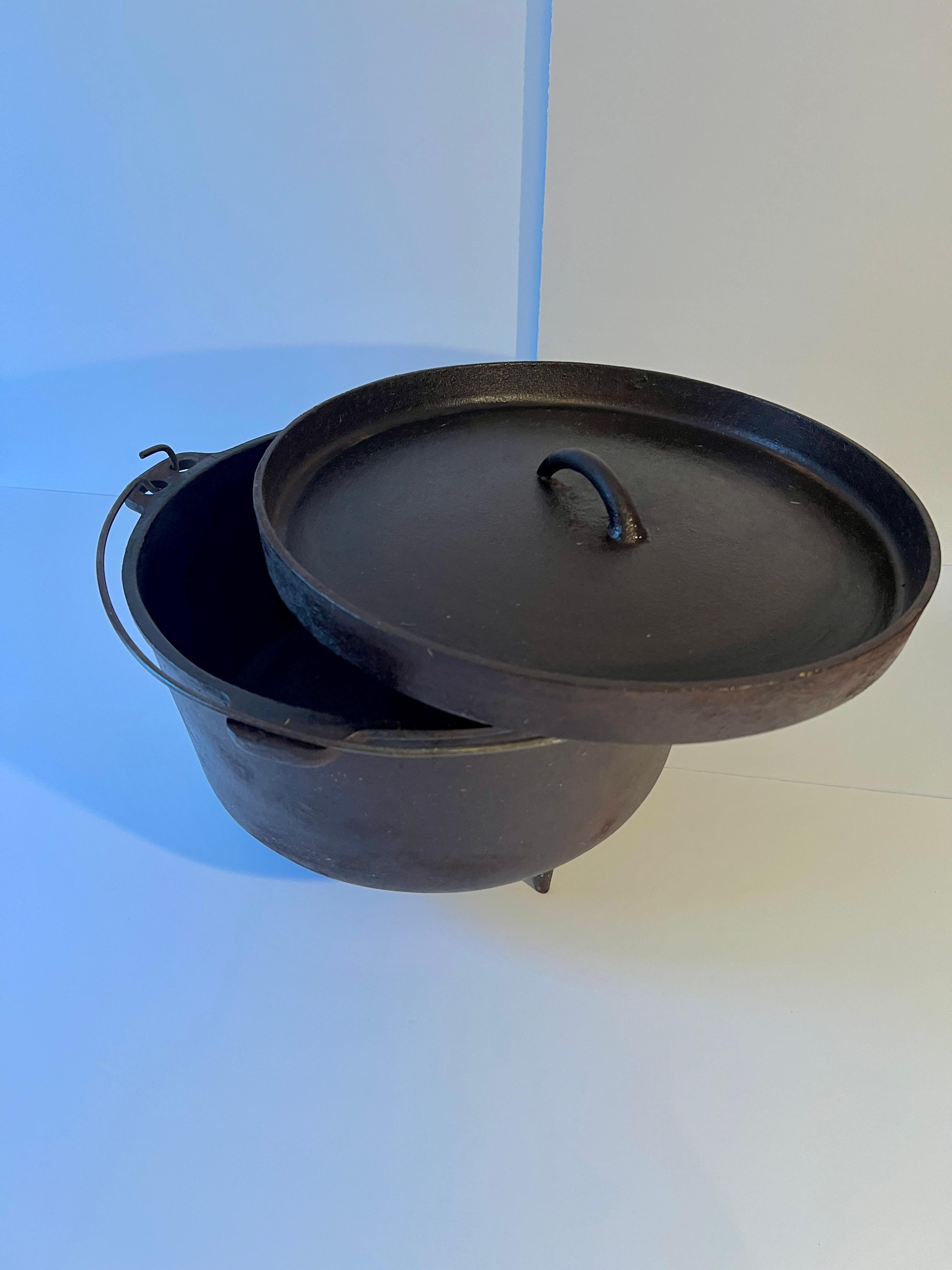 Metal Cast Iron Pot or Cauldron on Three Lets with Handle For Sale