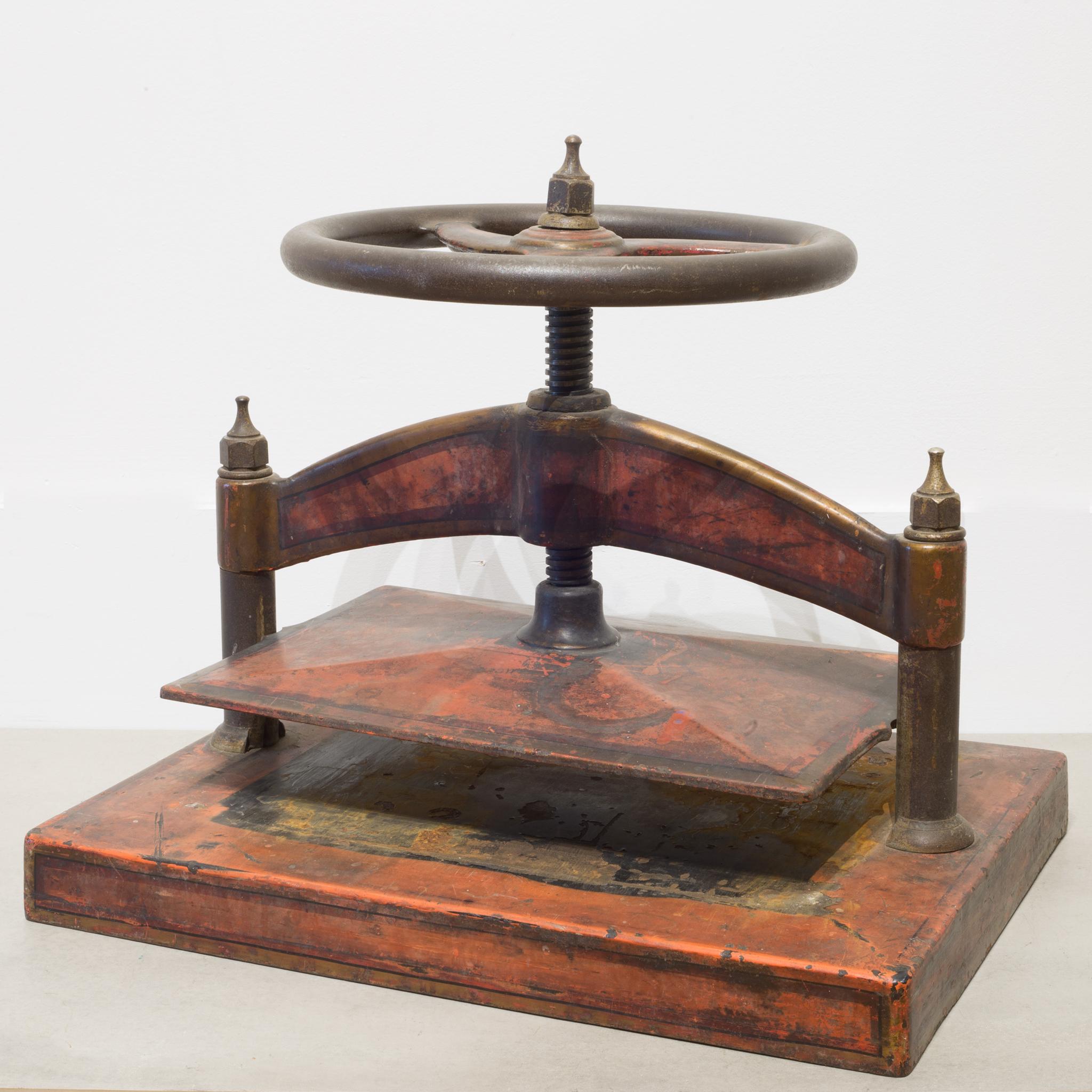 Industrial Cast Iron Red Polychromed and Stenciled Wheel Book Press, circa 1930