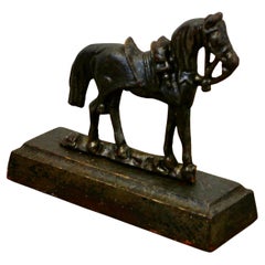 Cast Iron Saddled Horse, Door Stop  This lovely piece has been cast in one piece