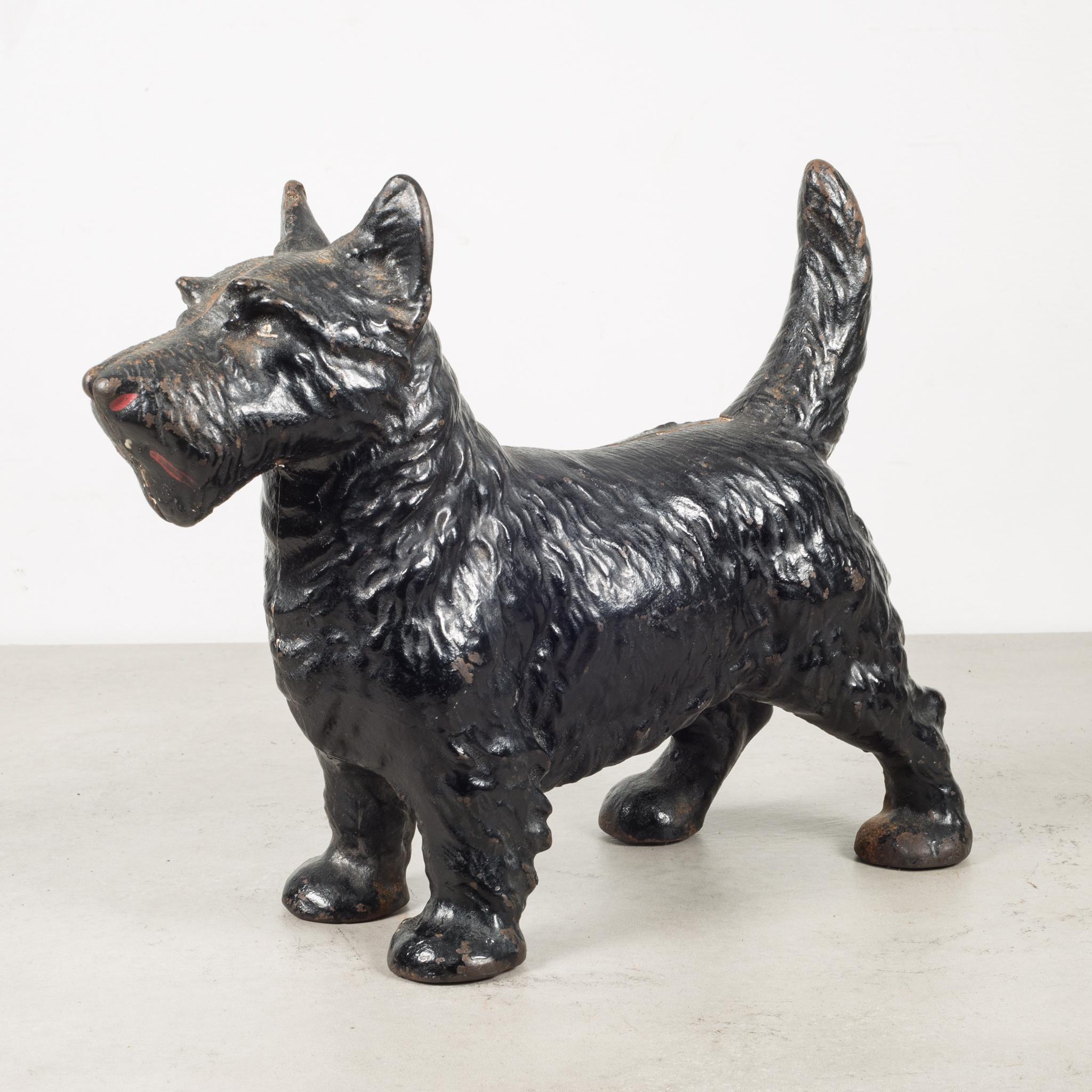 About

This is an original cast iron Scottish Terrier doorstop manufactured by the Hubley Manufacturing Company in Lancaster Pennsylvania USA. The piece has retained its original hand painted finish and is in good condition with the appropriate