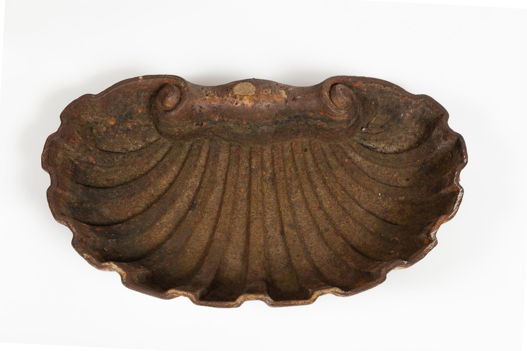 Cast Iron Shell Form Garden Ornament, circa 1920. Heavy cast piece, finely detailed. Aged patina.