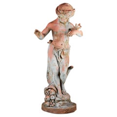 Antique Cast Iron Statue of Cherub with Butterfly Balanced on Their Arm