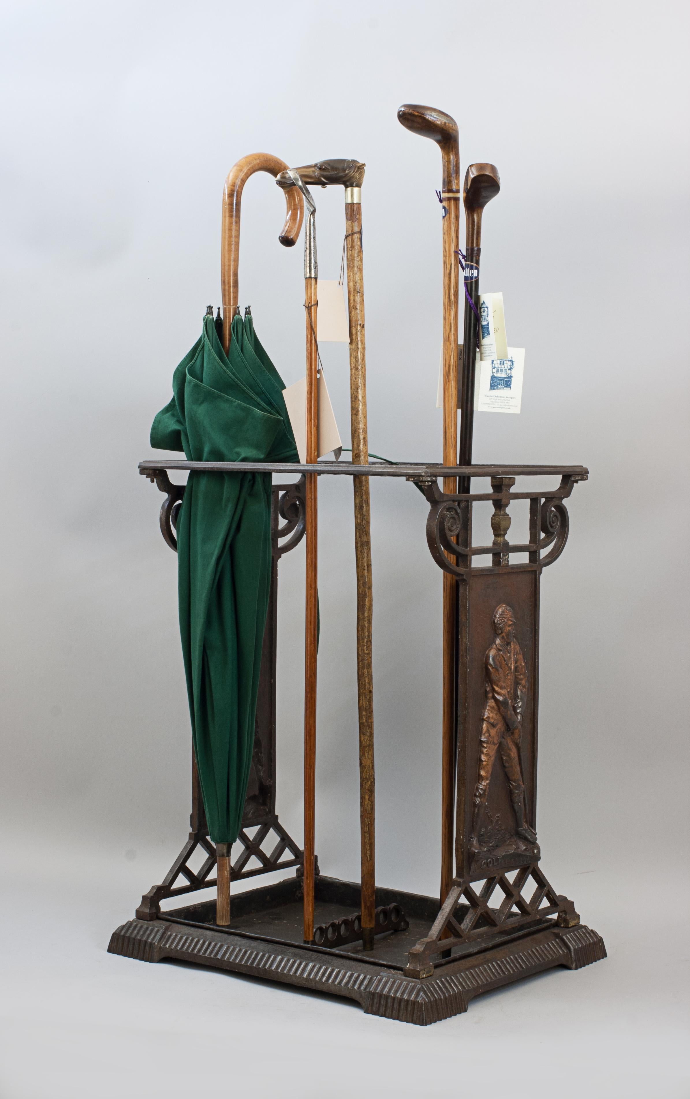 Cast Iron Golf Umbrella Stand.
An extremely rare original antique cast iron umbrella or stick stand. The two side plates depicts a male golf player in relief, inscribed below 'GOLF'. The stand comes with the original removable drip tray. The piece