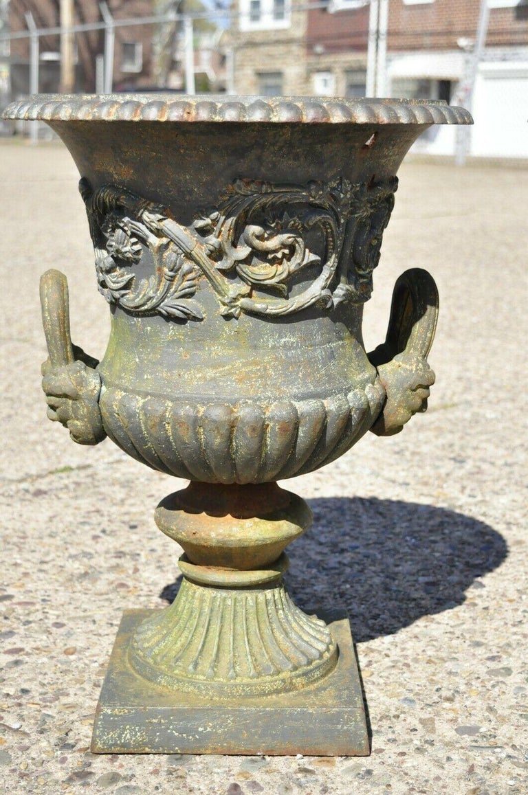 Cast Iron Victorian Urn Form Weathered Planters with Face Handles 'A', a Pair For Sale at 1stDibs