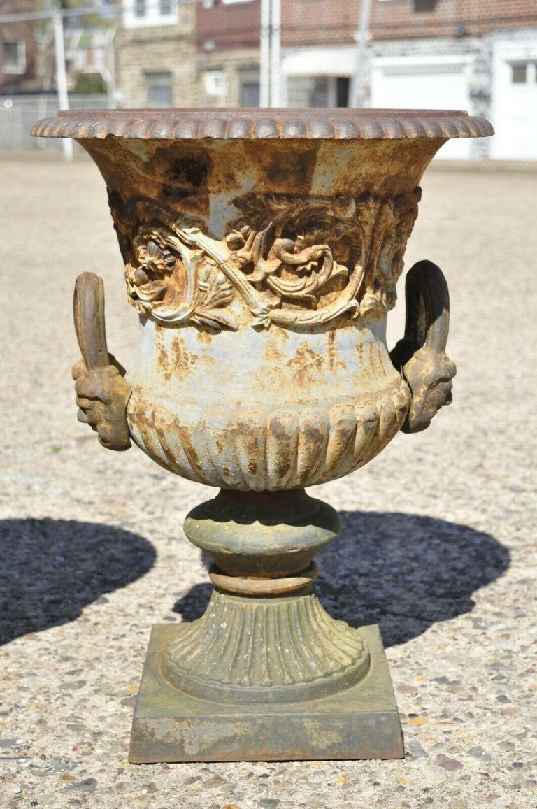 Cast Iron Victorian Urn Form Weathered Planters with Face Handles 'A', a Pair For Sale at 1stDibs
