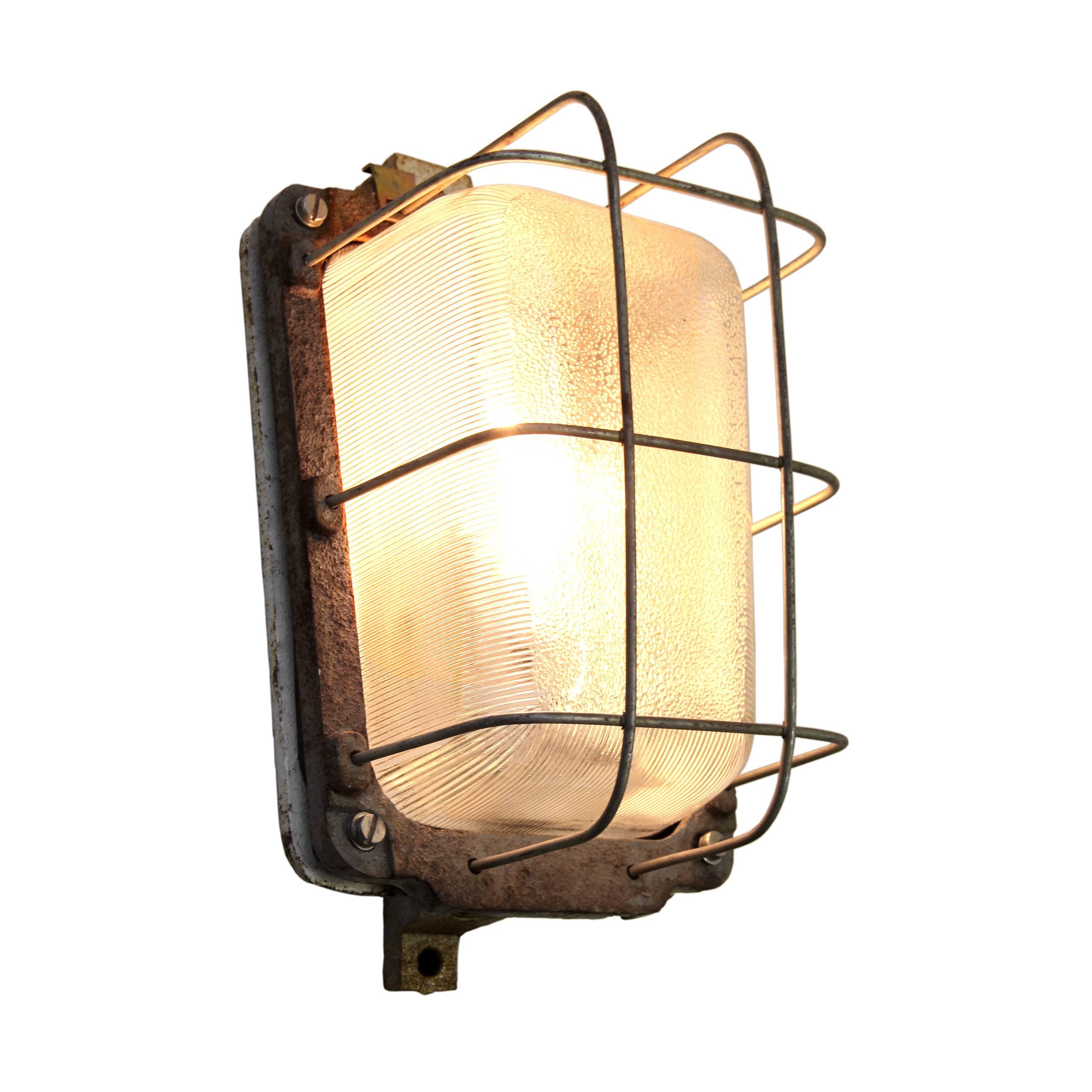 European Industrial wall or ceiling classic. Cast iron with Holophane glass. Also for use outdoors. 

Measure: Weight 5.0 kg / 11 lb.

All lamps have been made suitable by international standards for incandescent light bulbs, energy-efficient and