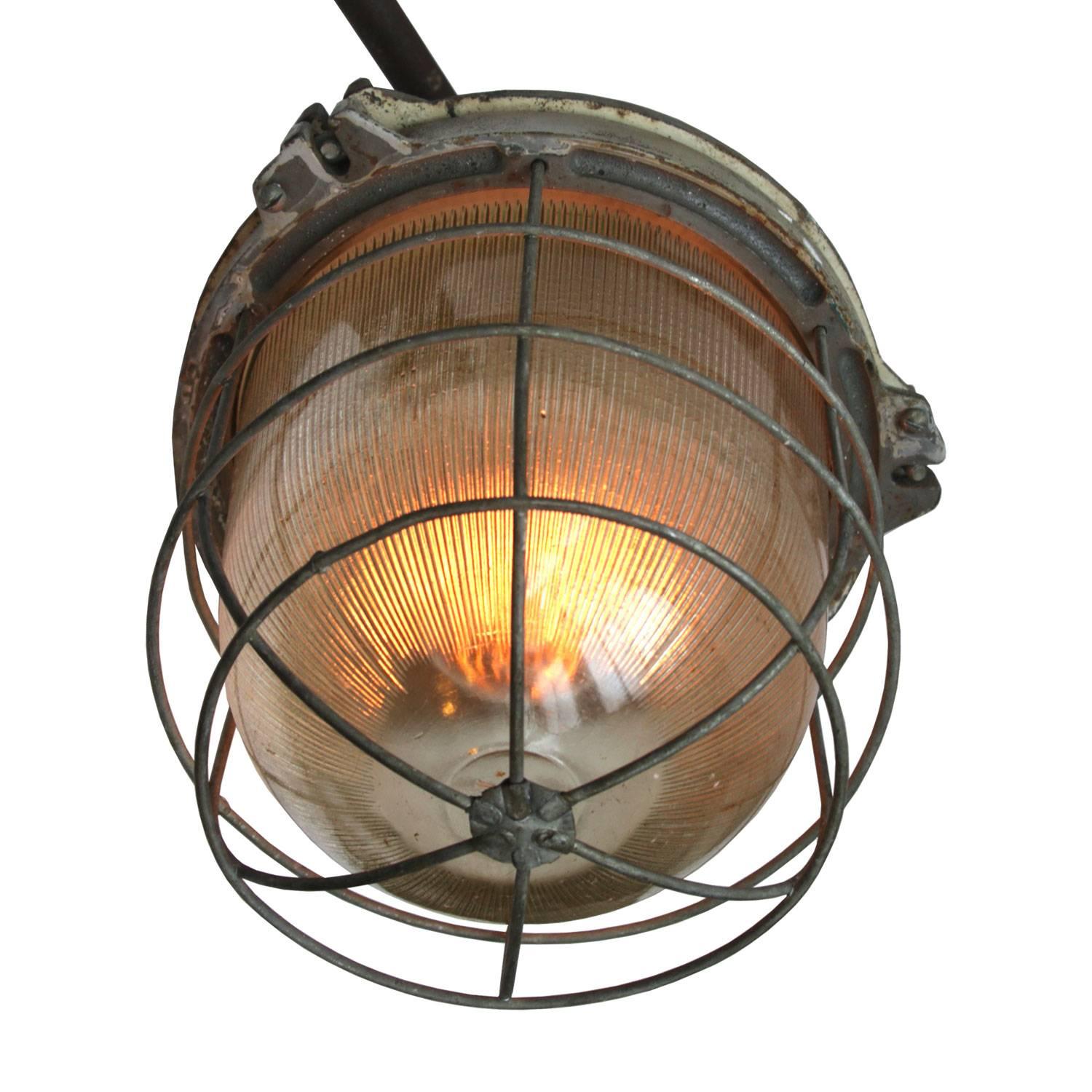 Cast Iron Vintage Industrial Holophane Glass Cage Wall Lights In Good Condition In Amsterdam, NL