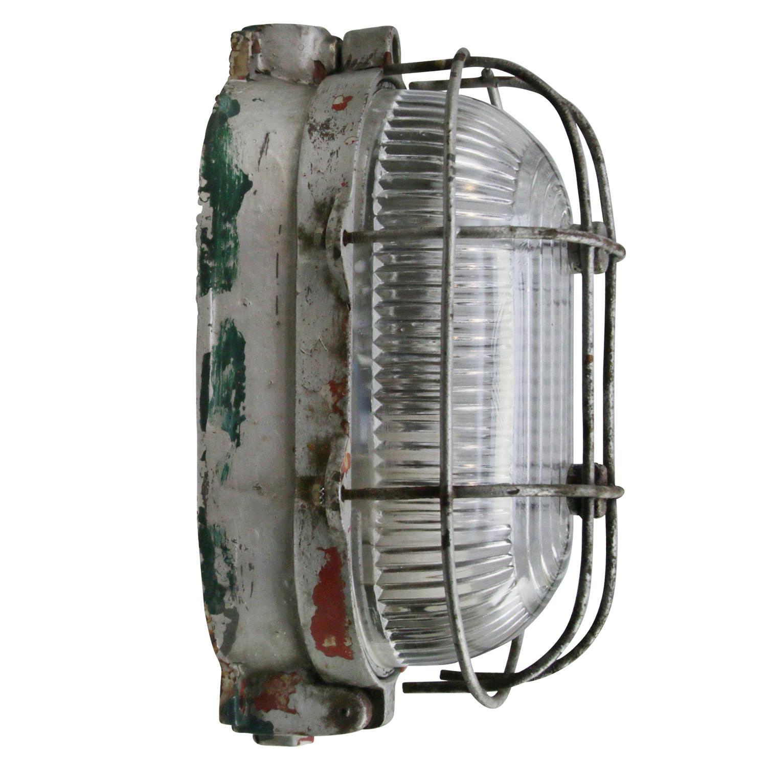 Industrial wall or ceiling lamp
cast iron, clear Holophane glass

Weight: 3.70 kg / 8.2 lb

Priced per individual item. All lamps have been made suitable by international standards for incandescent light bulbs, energy-efficient and LED bulbs.
