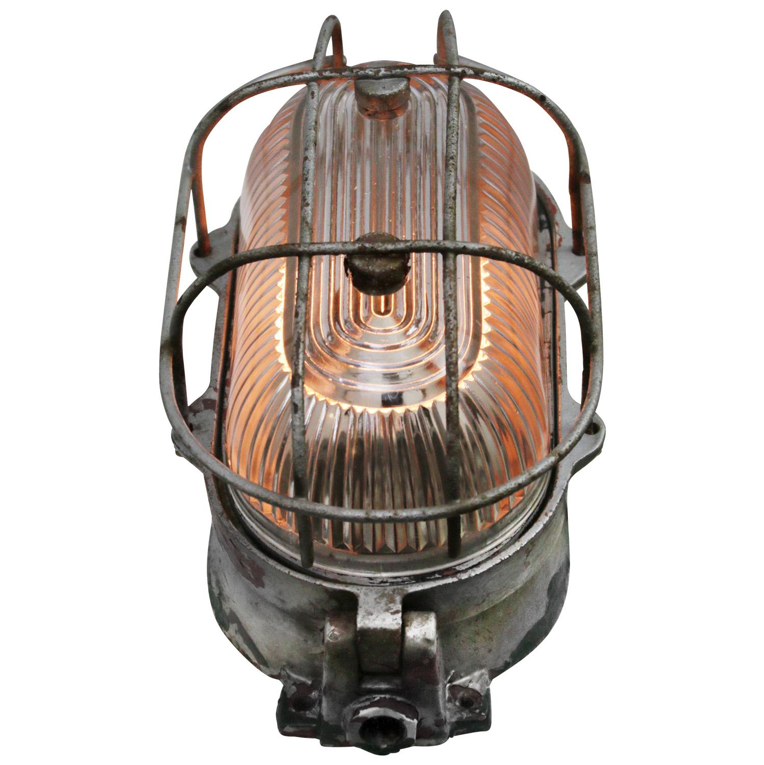 Cast Iron Vintage Industrial Holophane Striped Glass Wall Lamp Scone In Good Condition For Sale In Amsterdam, NL