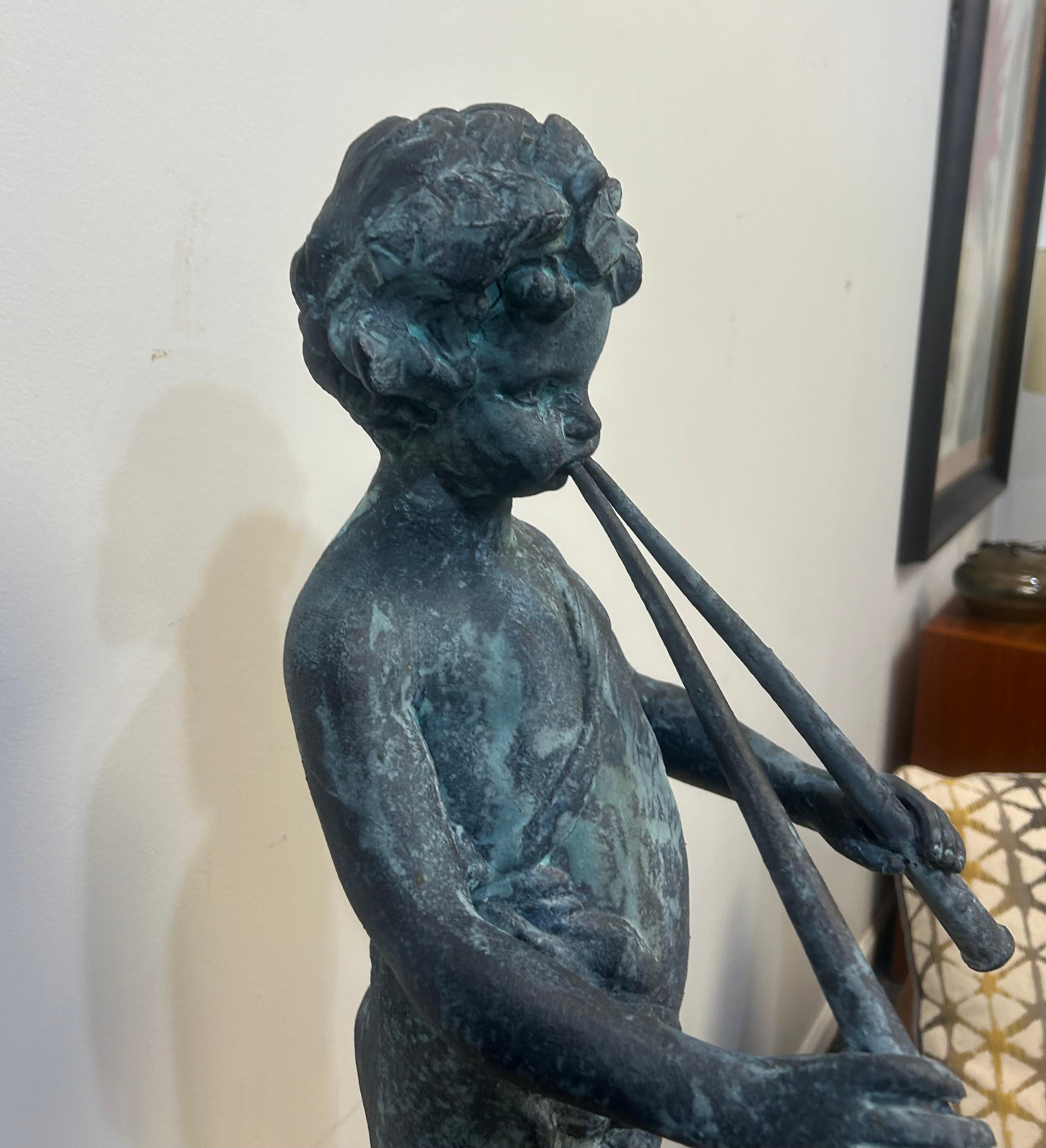 Cast lead garden statue of Pan as a young boy playing paired pipes For Sale 5