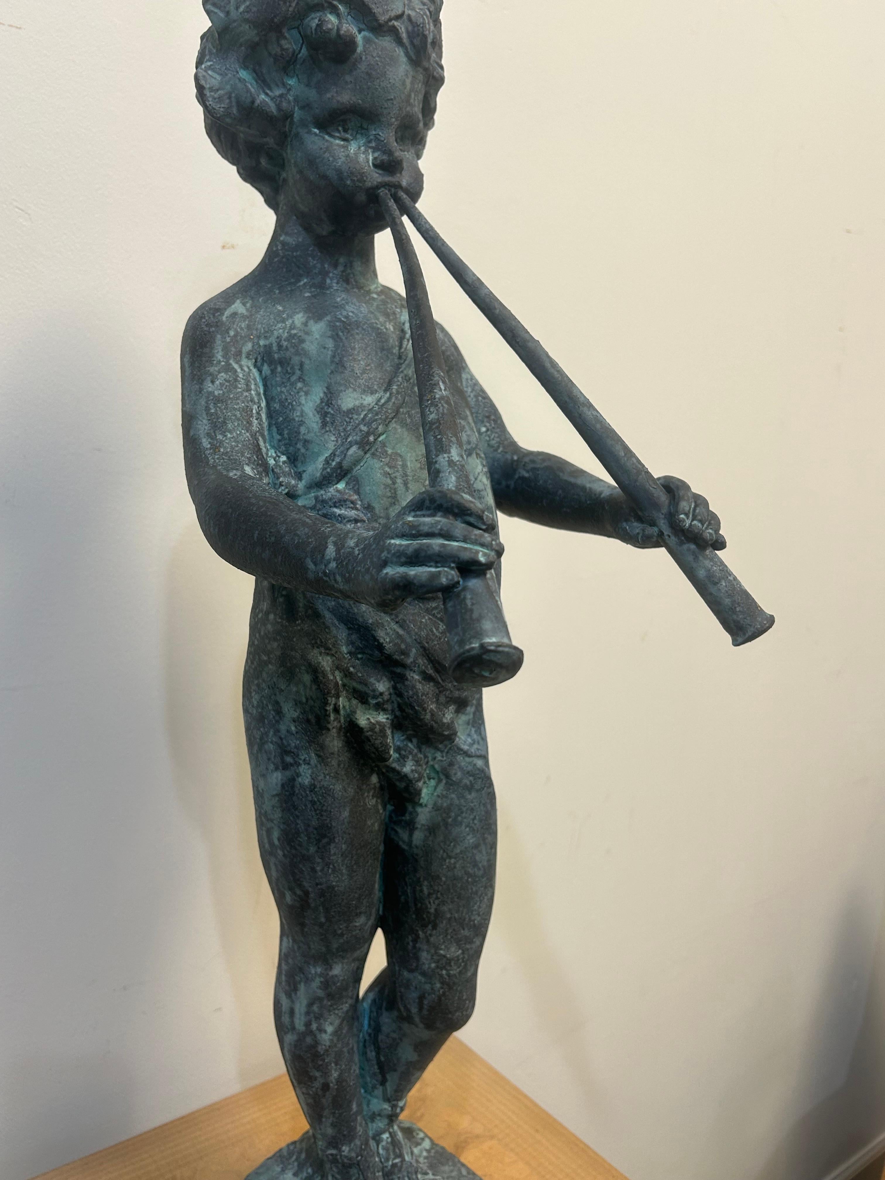 Cast lead garden statue of Pan as a young boy playing paired pipes For Sale 8