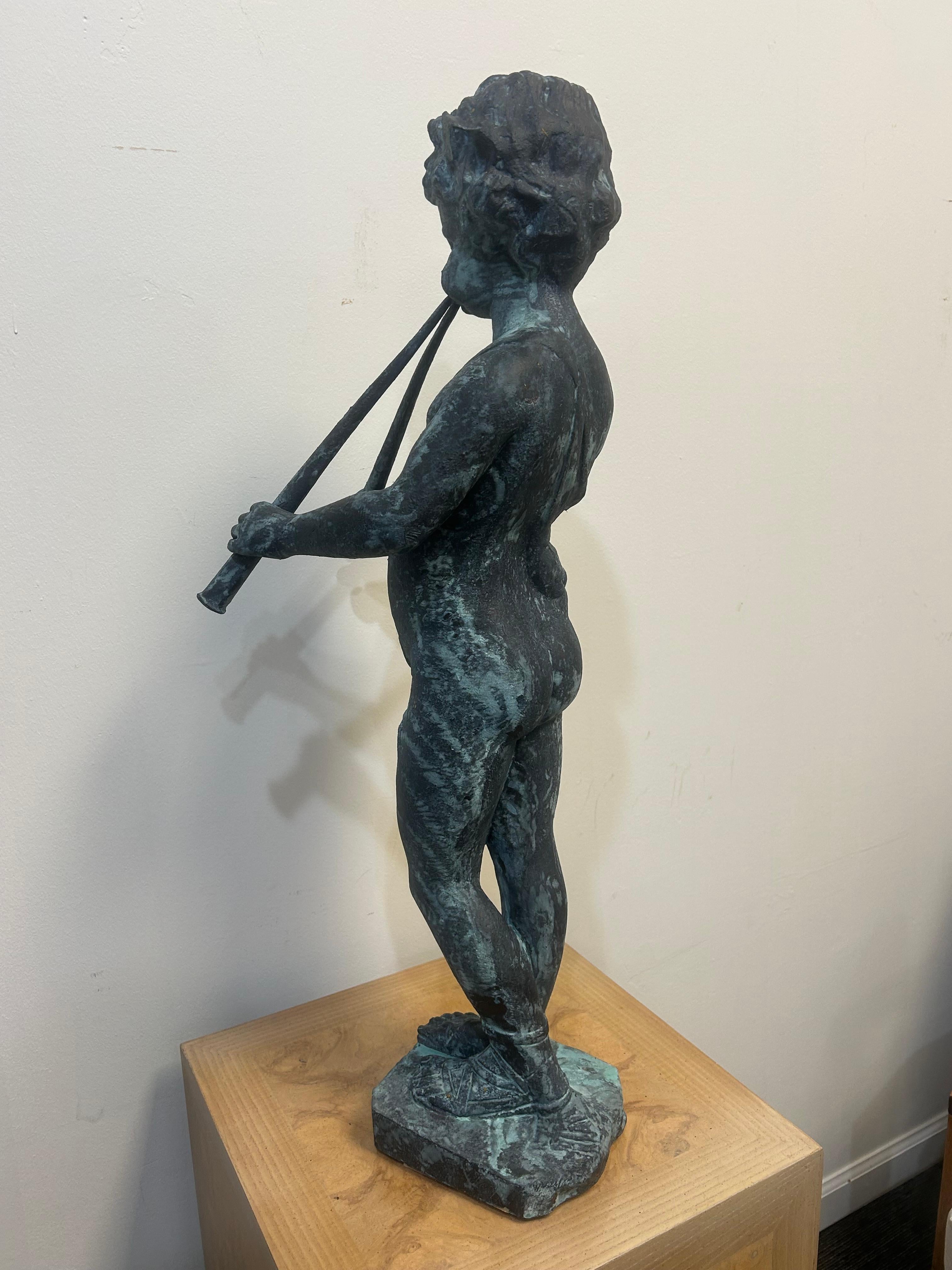 Cast lead garden statue of Pan as a young boy playing paired pipes For Sale 1