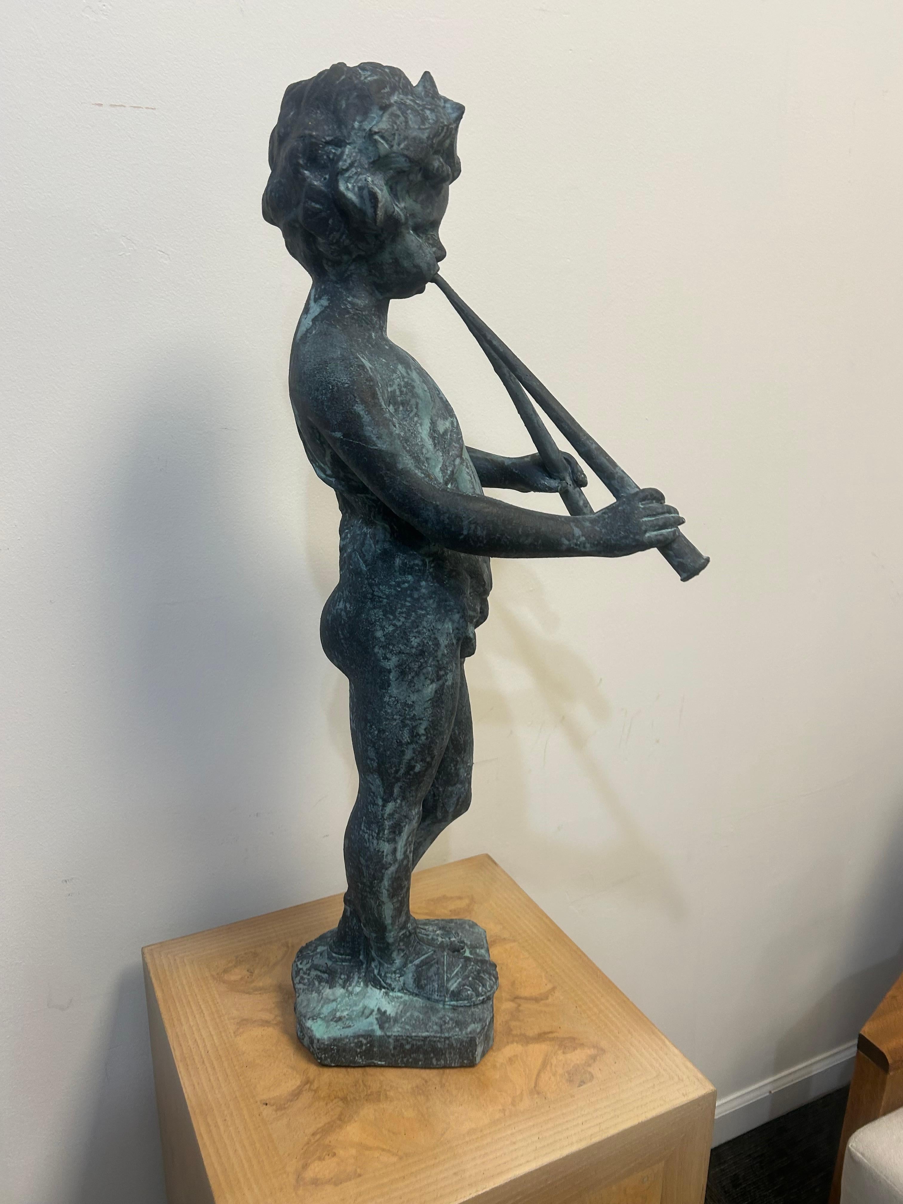 Cast lead garden statue of Pan as a young boy playing paired pipes For Sale 4