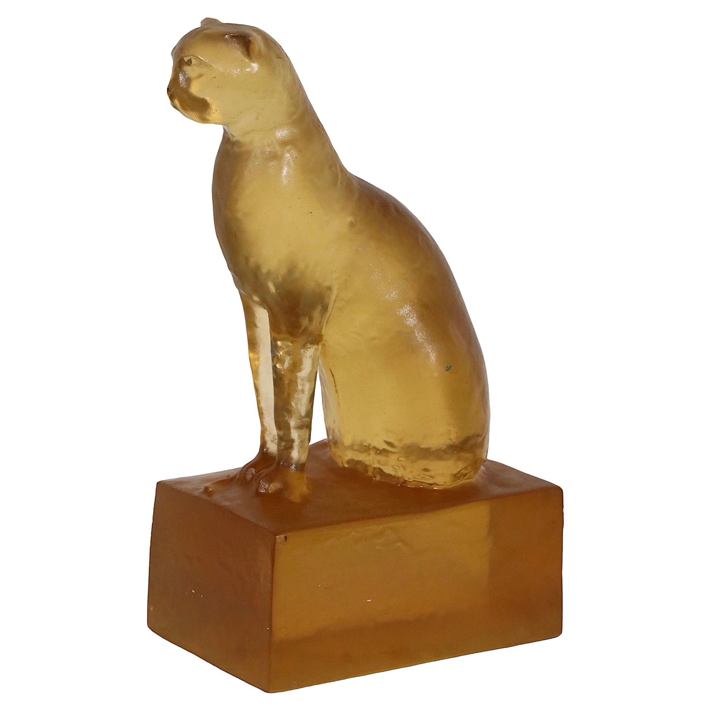 Chic 1940's cat sculpture in translucent yellow tone lucite, by design immortal Dorothy Thorpe.
