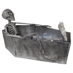 Cast Metal Skeleton Champagne Cooler in Coffin Form