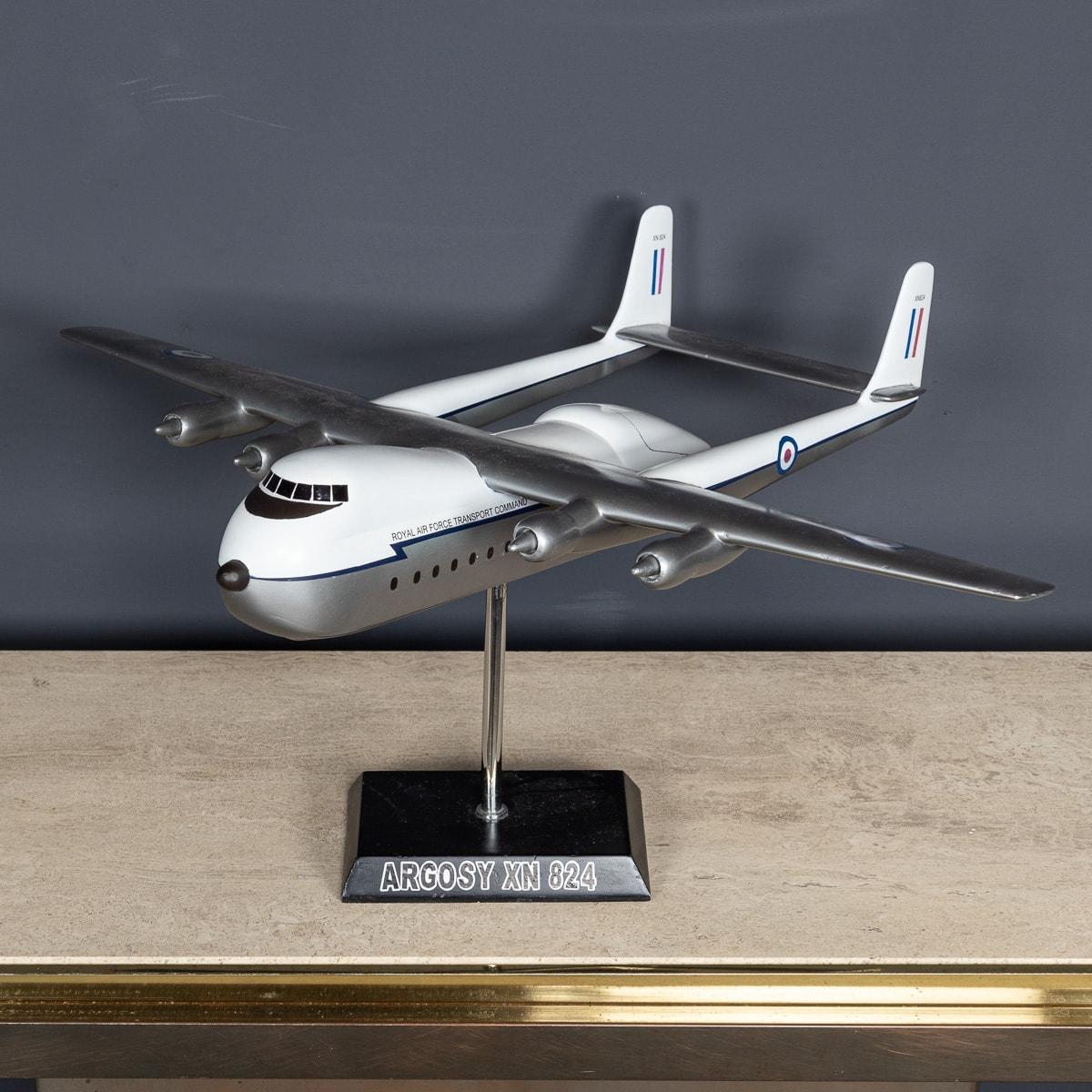 A superb mid 20th Century painted cast model depicting a British post-war transport plane, the Argosy XN 824 that served from 1959 to 1978 with the RAF. Following its military service, the aircraft continued flying in the private sector until its