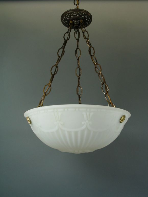 Opaline glass dome with rib, urn and swag detailing. Three lights.
Take 3 60 watt Edison based bulbs
Chain can be added to increase length.