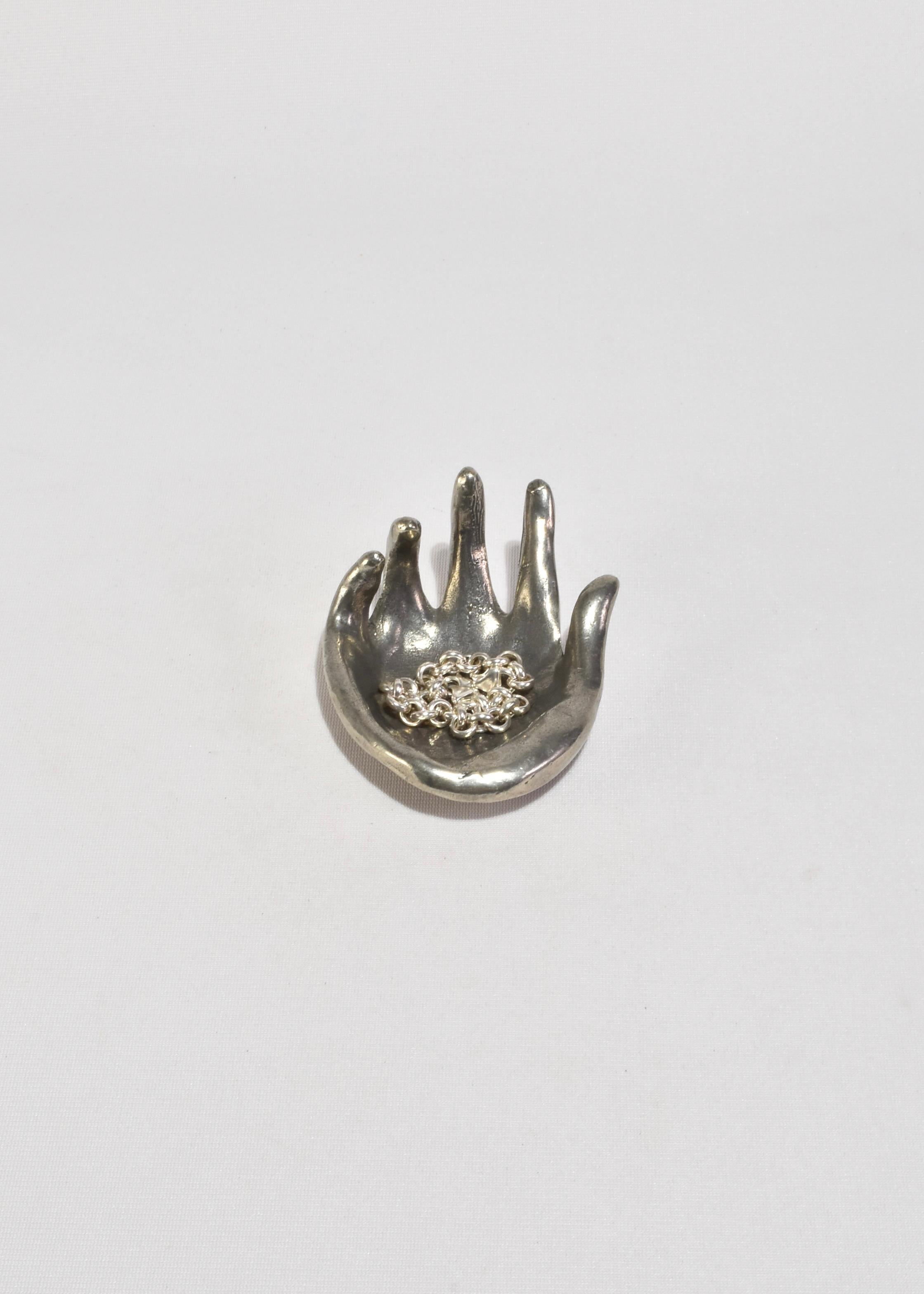 Mano de estaño fundido siglo XX en venta