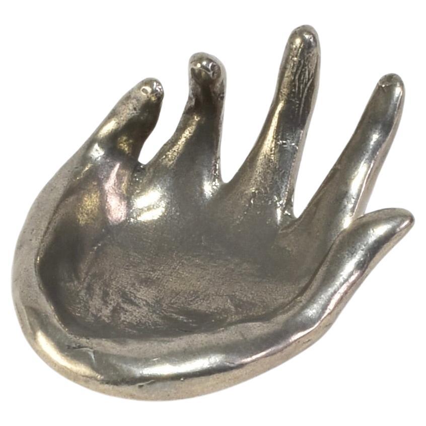 Mano de estaño fundido en venta