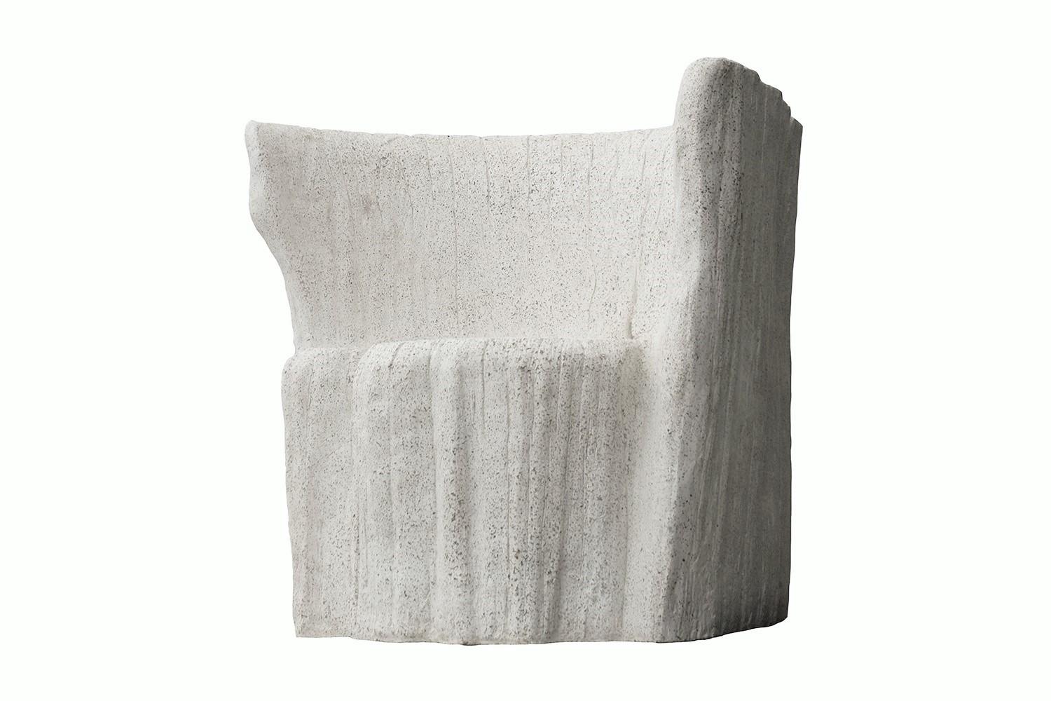 The mold for this Acacia chair was created from an actual tree stump. Pictured in our Natural Stone finish, the texture and modern look make it appropriate for a wide variety of styles and spaces.

Dimensions: Width 37 in. (94 cm), depth 29 in. (74