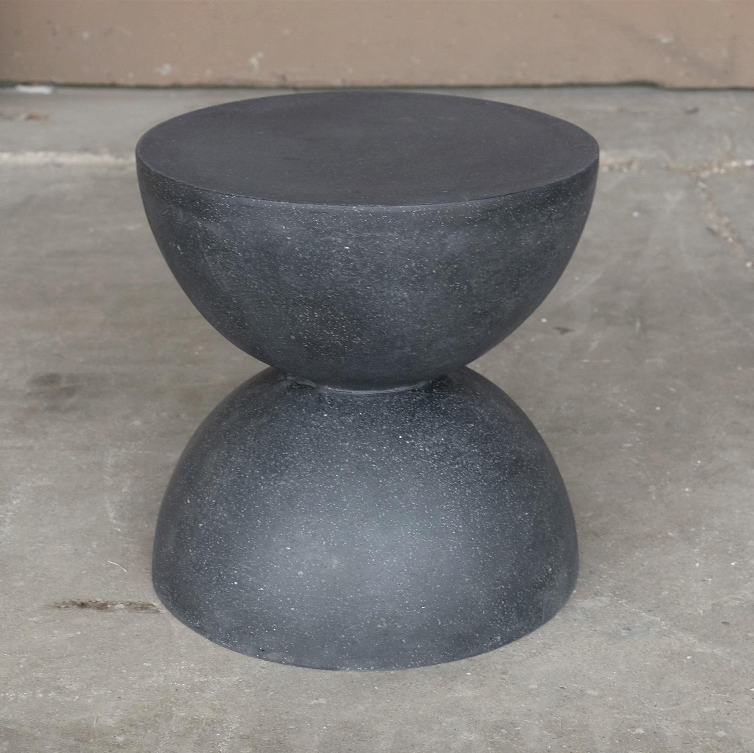 A symmetrical sculptural balance of elegance and function. 

Dimensions: Diameter 18 in. (45.7 cm), height 18 in. (45.7 cm). Weight 20 lbs. (9 kg)

Finish color options:
white stone
natural stone
aged stone
key stone
coal stone (shown)

Materials: