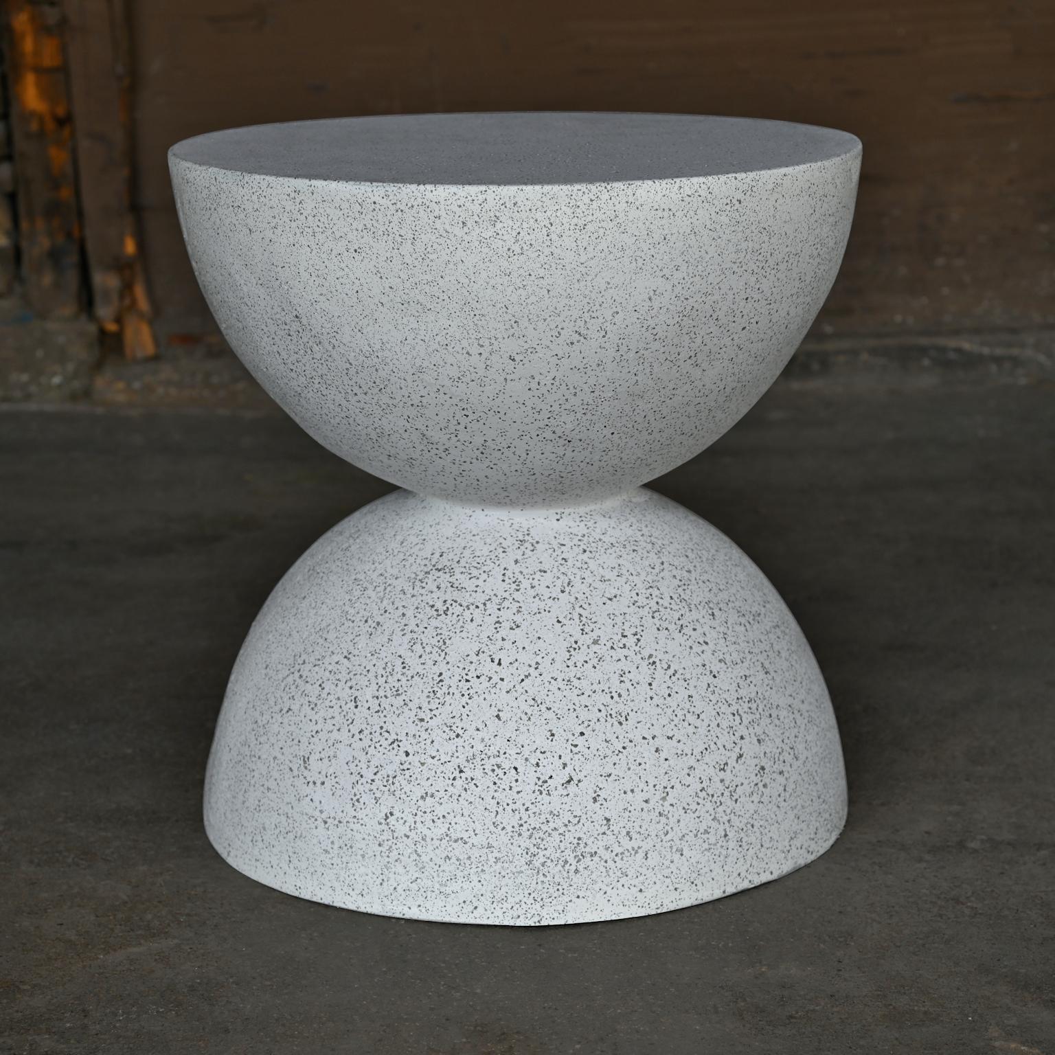 A symmetrical sculptural balance of elegance and function. 

Dimensions: Diameter 15 in. (38 cm), height 16 in. (40.6 cm). Weight 20 lbs. (9 kg)

Finish color options:
white stone
natural stone (shown)
aged stone
keystone
coal stone

Materials: