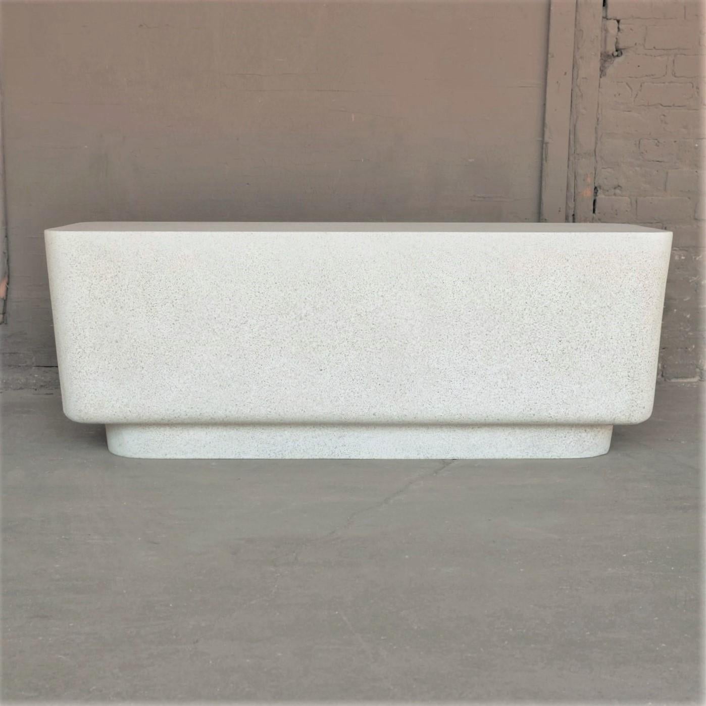 The block bench is pictured in our natural stone finish. The texture and modern look of concrete make it appropriate for a wide variety of styles and spaces.

Dimensions: Width 48 in. (122 cm), depth 18 in. (45.7 cm), height 18 in. (45.7 cm). Weight