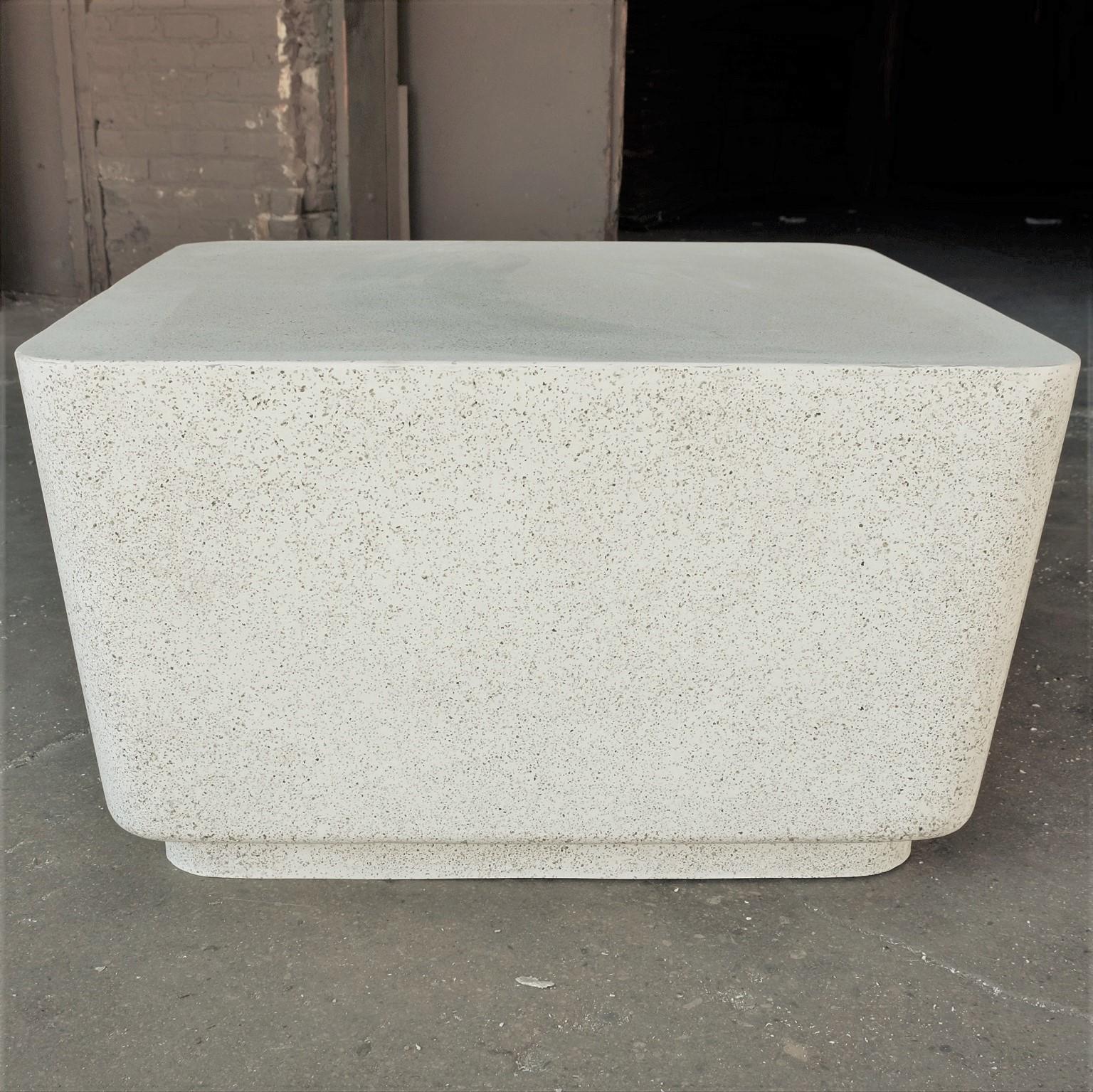 Rounded edges form a continuous plane, juxtaposing rigid structural expectation with an infinite expanse. A reliable, welcoming presence.

Dimensions: Width 32 in. (81.3 cm), depth 32 in. (81.3 cm), height 18 in. (45.7 cm). Weight 45 lbs. (20.4