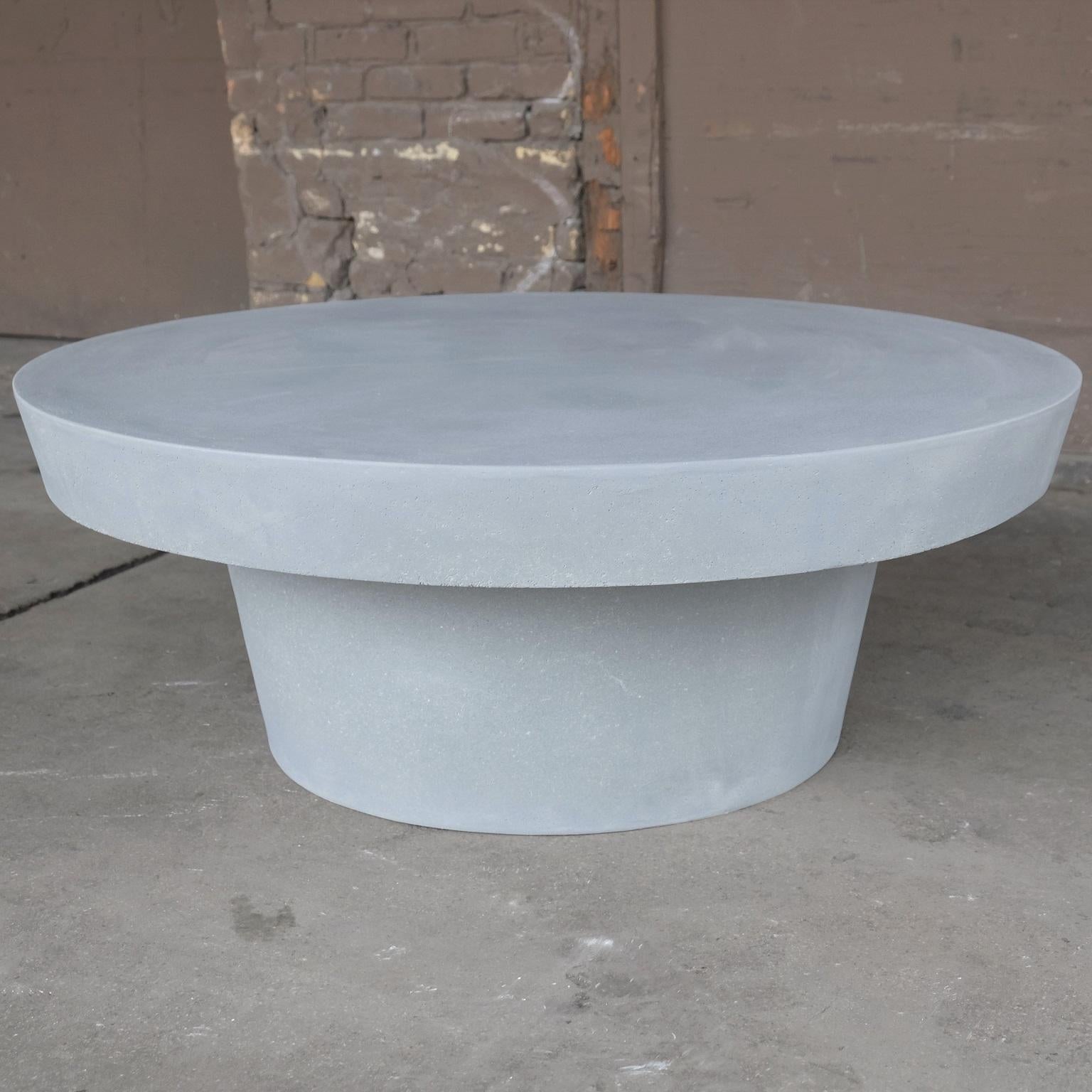 A place of balance and equilibrium. A smooth, beveled edge gently guides the eye around the form, showcasing its fields of stone aggregate.

Dimensions: Diameter 42 in. (107 cm), height 16 in. (41 cm). Weight 80 lbs. (36 kg).

Finish color