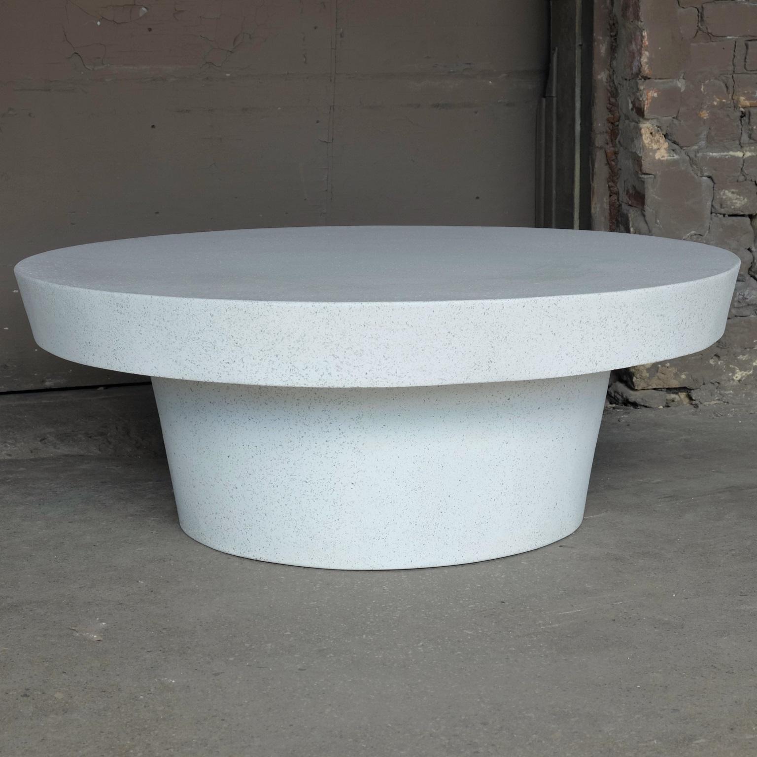 A place of balance and equilibrium. A smooth, beveled edge gently guides the eye around the form, showcasing its fields of stone aggregate.

Dimensions: Diameter 45 in. (114 cm). Height 16 in. (41 cm). Weight 85 lbs. (38.5 kg).

Finish color