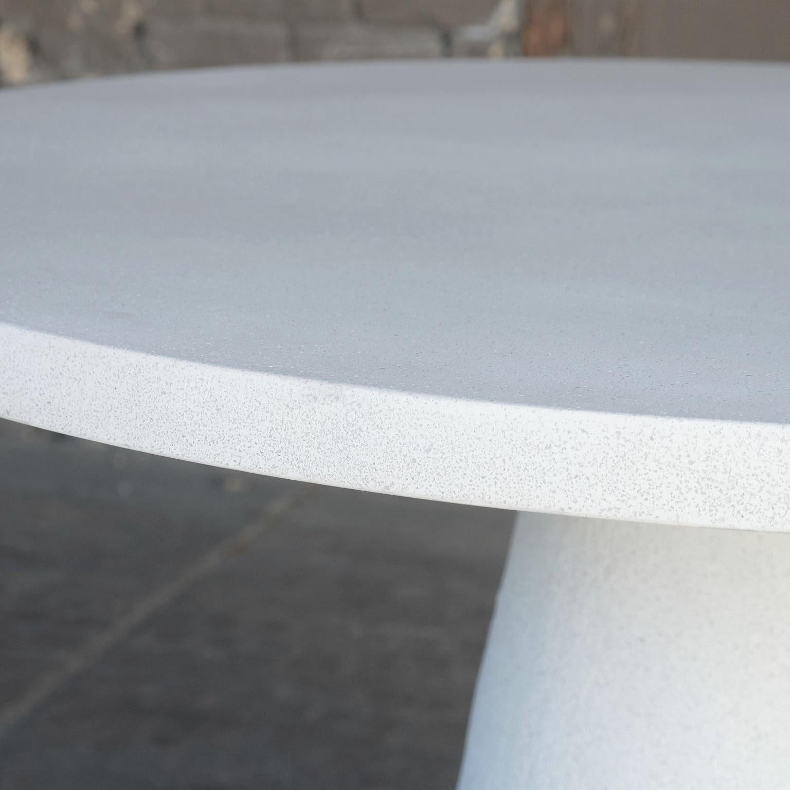 white stone round dining table