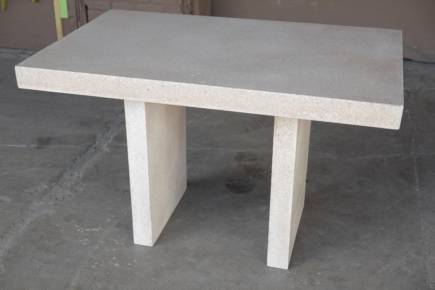 Ledge Dining Table. 

Dimensions: Width 48in. (122 cm), depth 30 in. (76 cm), height 30 in. (76 cm), weight 40 lbs. (18 kg).

Finish color options:
white stone
natural stone
aged stone (shown)
keystone
coal stone

Materials: resin, stone aggregate,