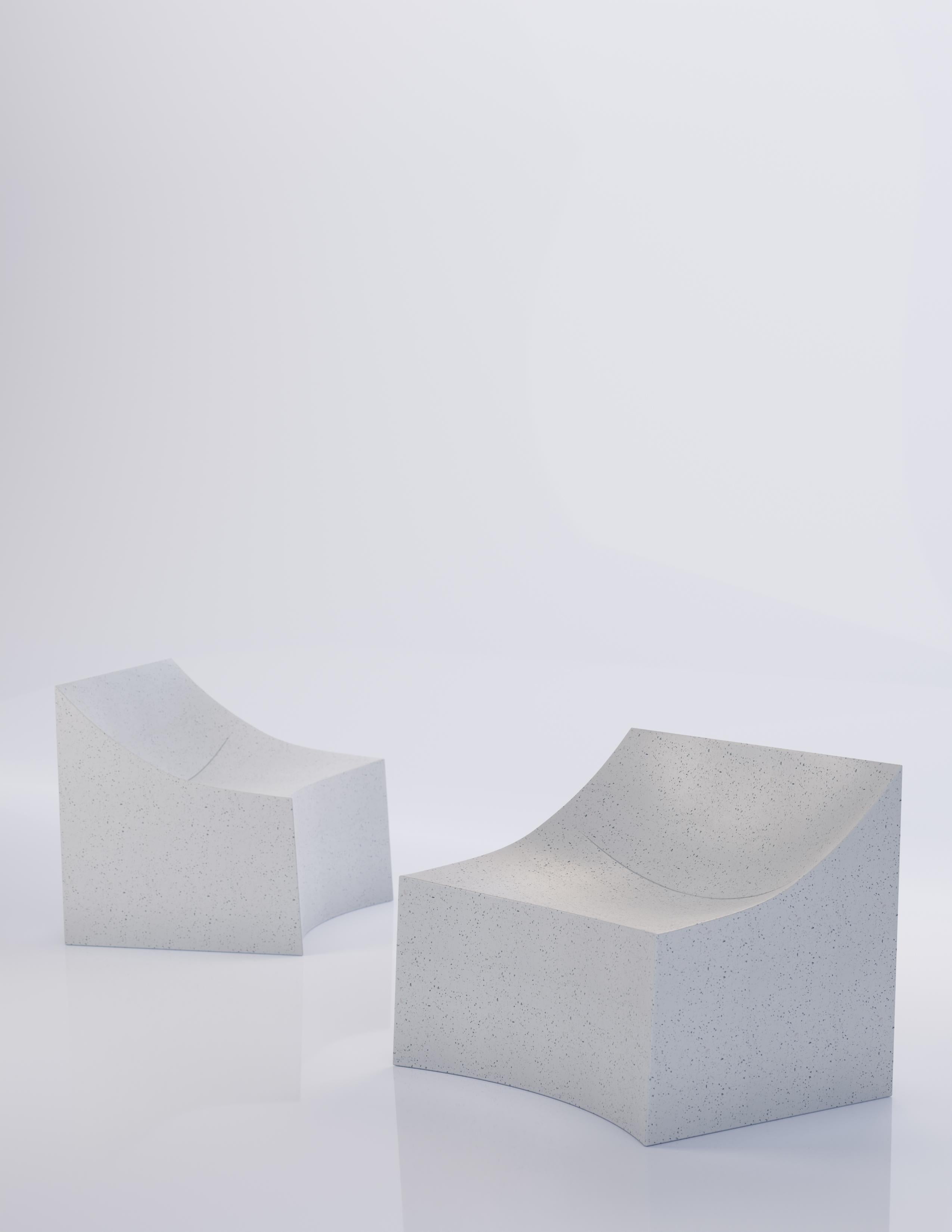A gently curved silhouette lends comfort and elegance to this monolithic lounger. A slight, swooping indentation in the seat subverts the expectation of stonework, subtly showcasing our lightweight construction.

Dimensions: Width 36 in. (91 cm),