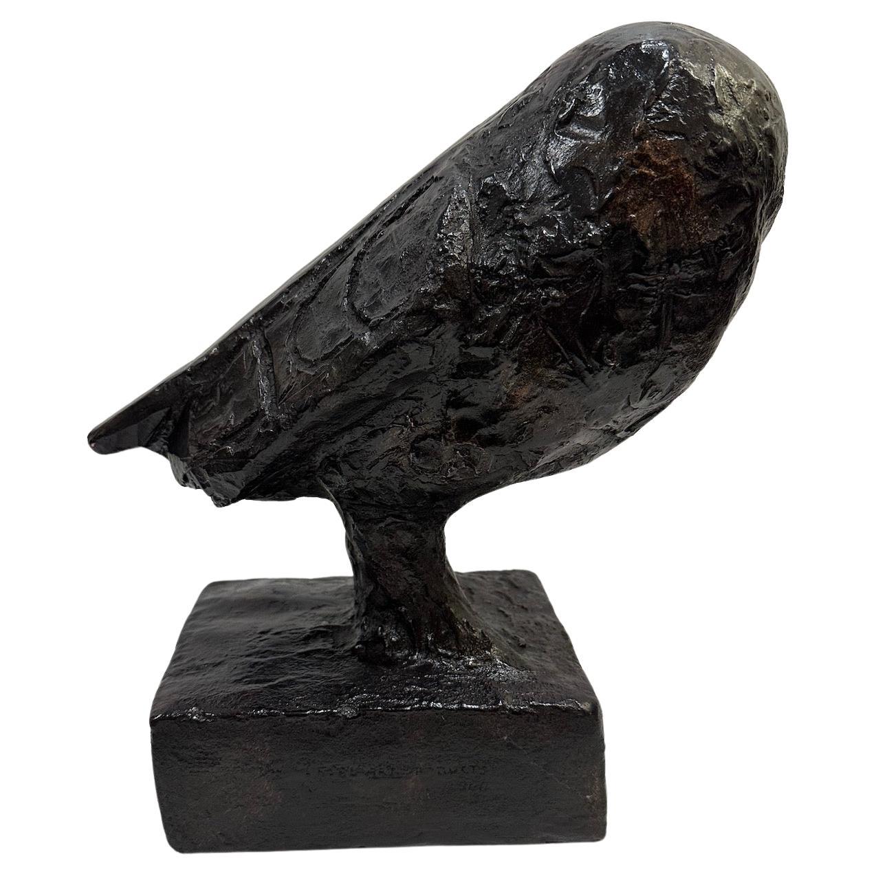 A charming, cast resin owl sculpture in the style of Picasso.  
