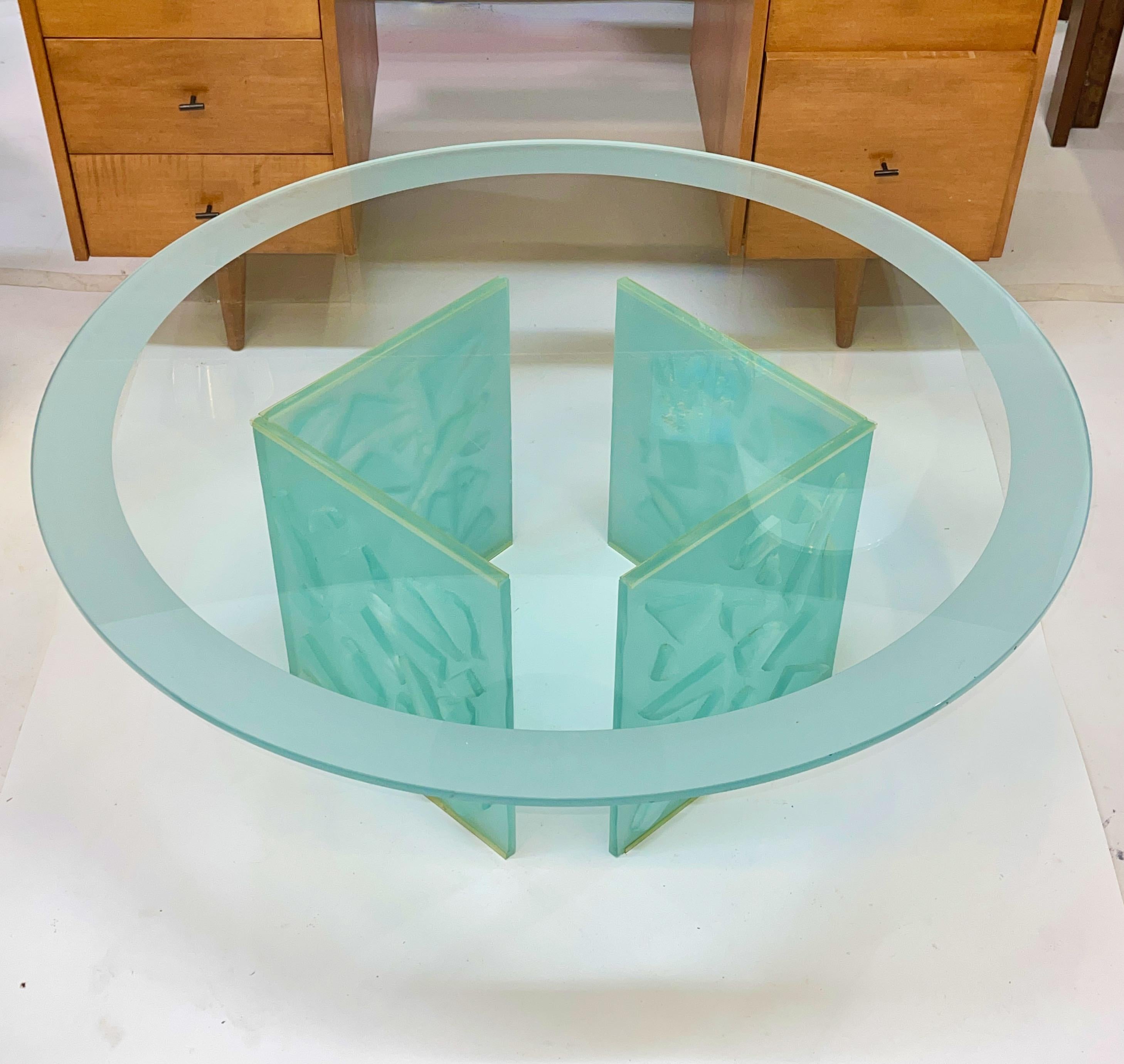 Cast and sandblasted glass base coffee table consisting of two pairs of corner angled glass panels 14