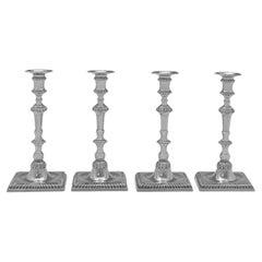 Cast set of 4 sterling silver candlesticks made in London in 1966