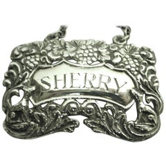 Etichetta da sherry in argento fuso con uva e vite e volpi, datata 1967, Londra