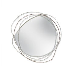 Specchio contemporaneo in ottone massiccio fuso