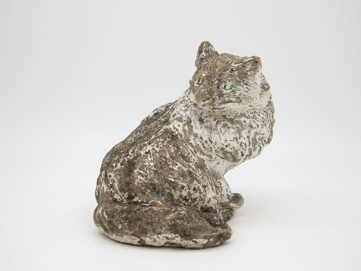A 1950s-era English cast stone cat. This model retains some of its original white paint and blue eyes. Lovely condition.