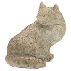 Ornement de jardin en pierre moulée représentant un chat