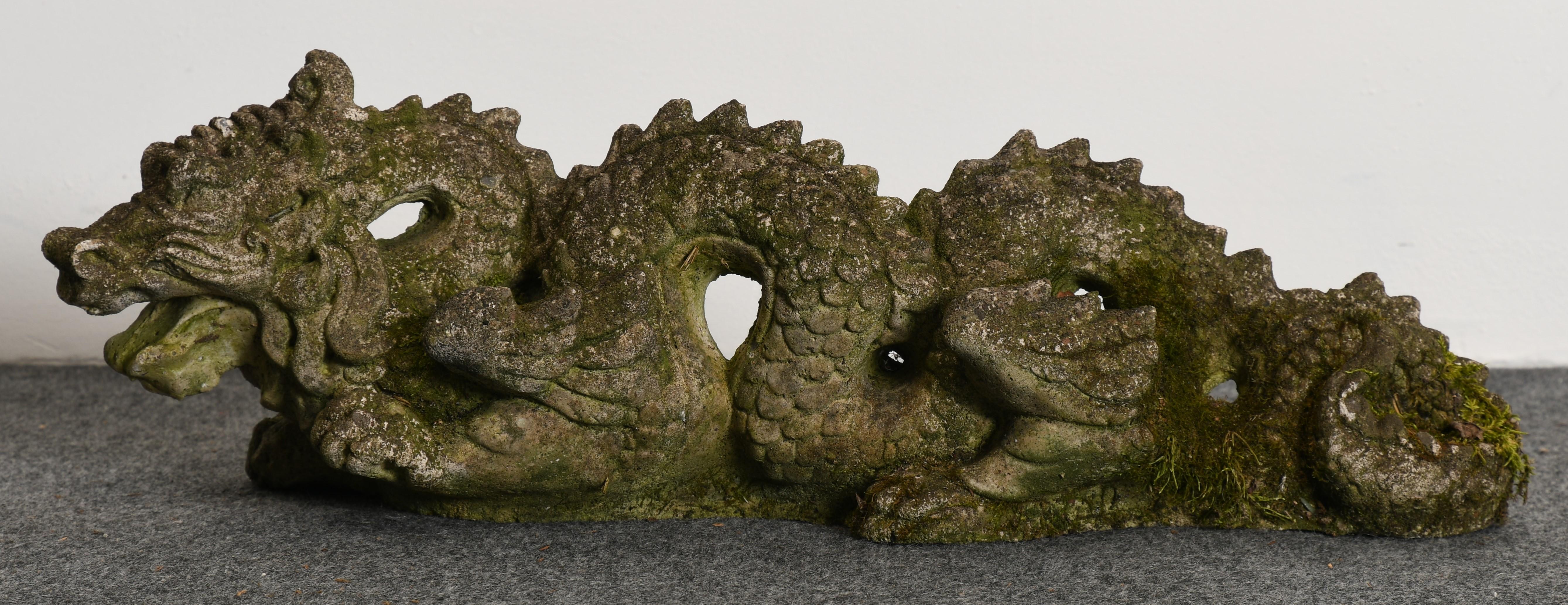 An ornamental cast stone dragon garden statue with great character and patina. This dragon is from a local Pennsylvania estate and would look good in any garden setting. New special pricing down from $450.00. Please ask about a personalized shipping