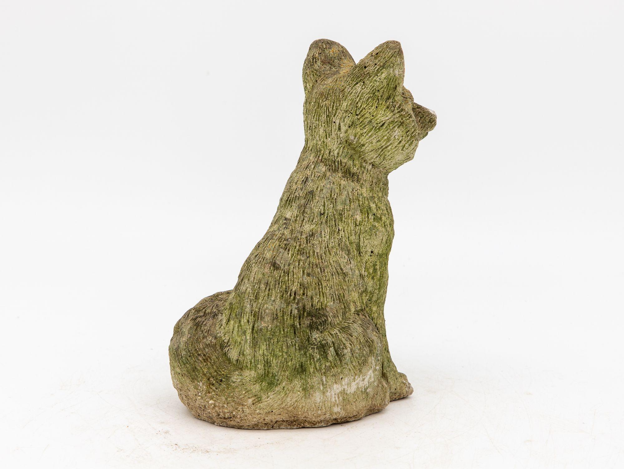 This charming 1950s concrete fox garden ornament exudes an authentic vintage appeal that adds a touch of character to any outdoor space. This captivating figure, skillfully crafted from robust concrete, embodies the playful stance and endearing