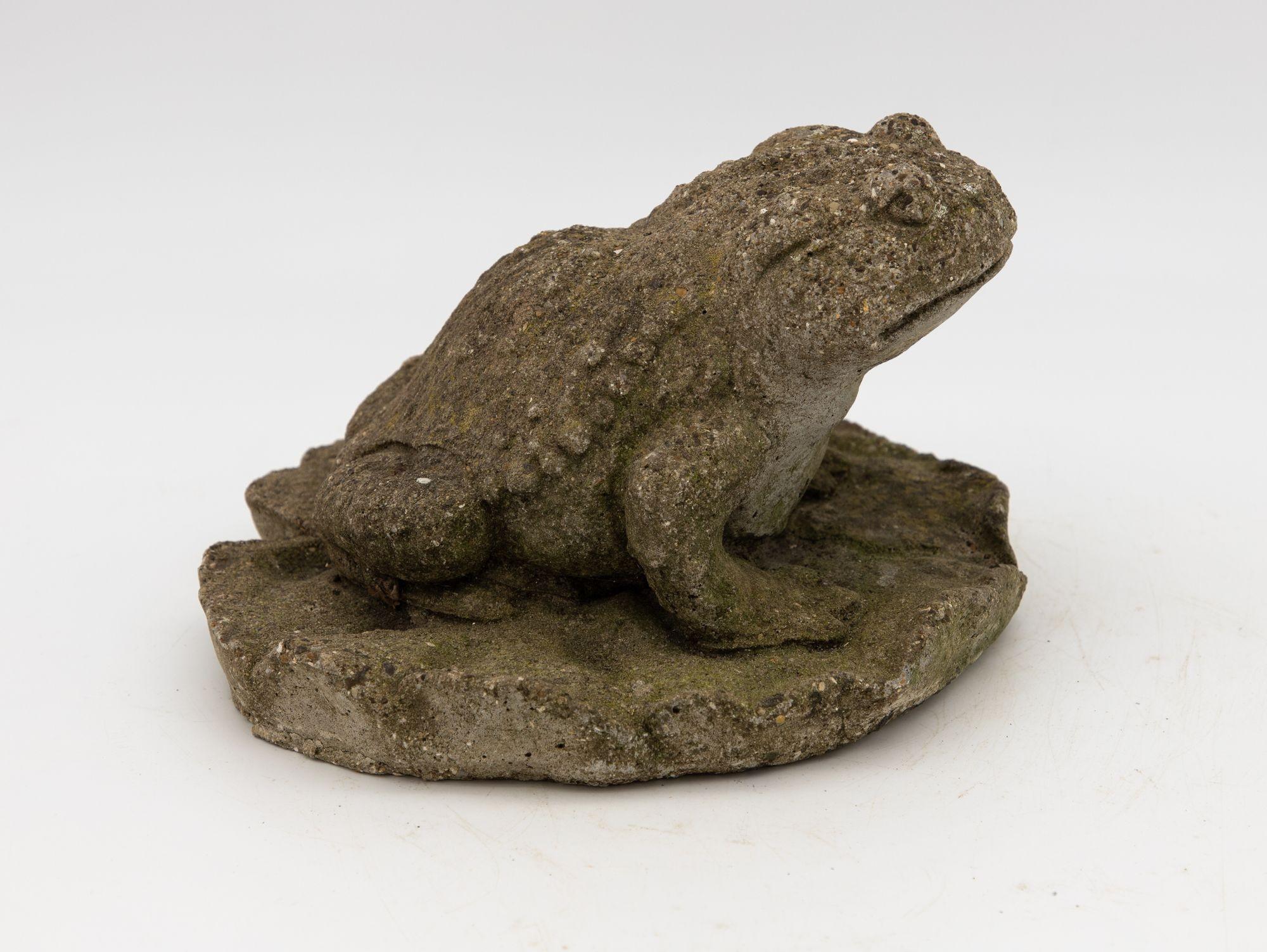 A mid 20th century stone seated frog as a fountain garden ornament. Lovely detail creates a lifelife look. Wear consistent with age and use.