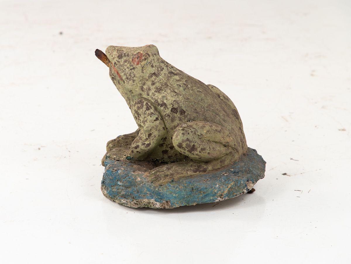 A mid 20th century painted stone seated frog as a fountain garden ornament. Lovely detail creates a lifelife look. Retaining much of the original paint on the body, eyes, and water on which it rests. Wear consistent with age and use.