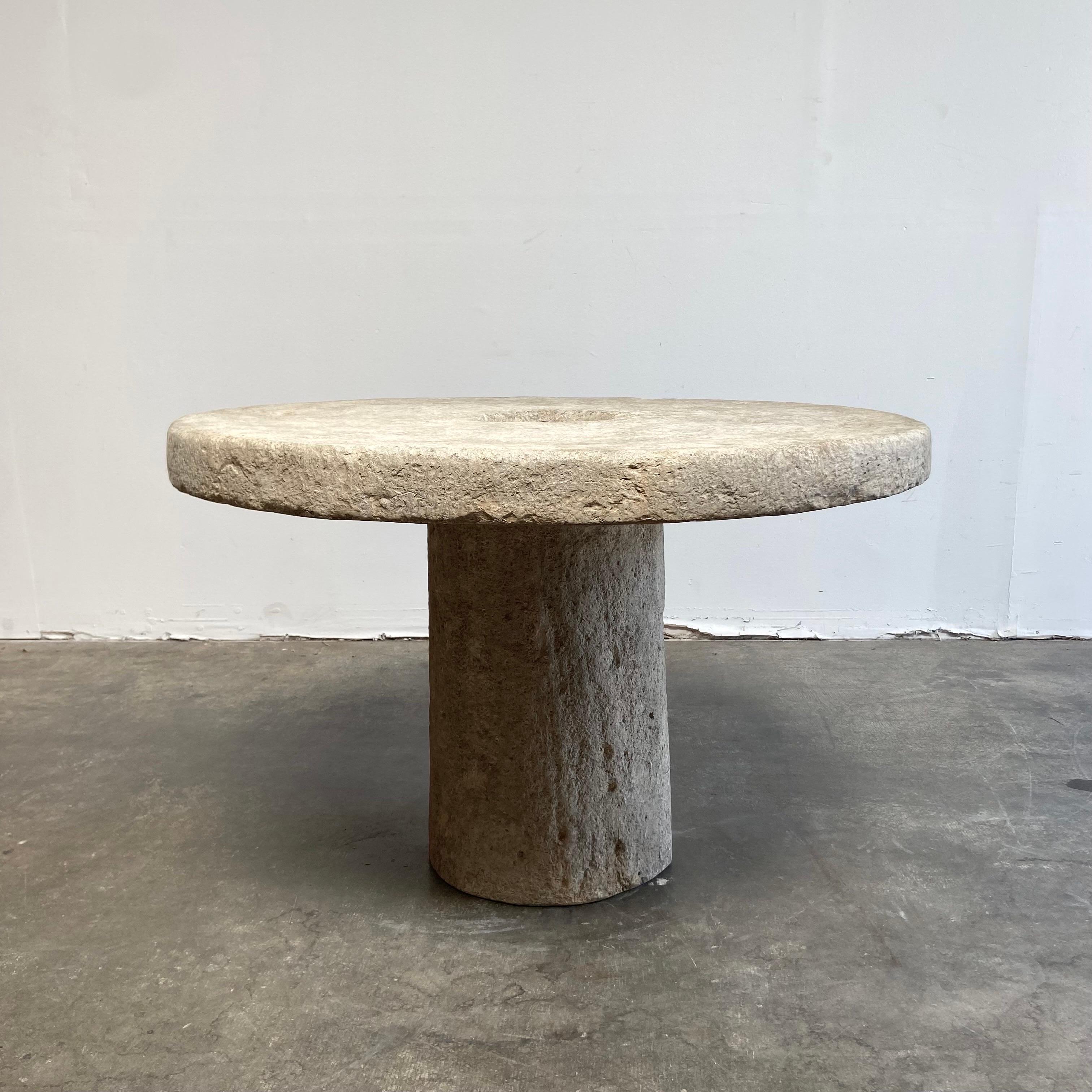 round stone garden table